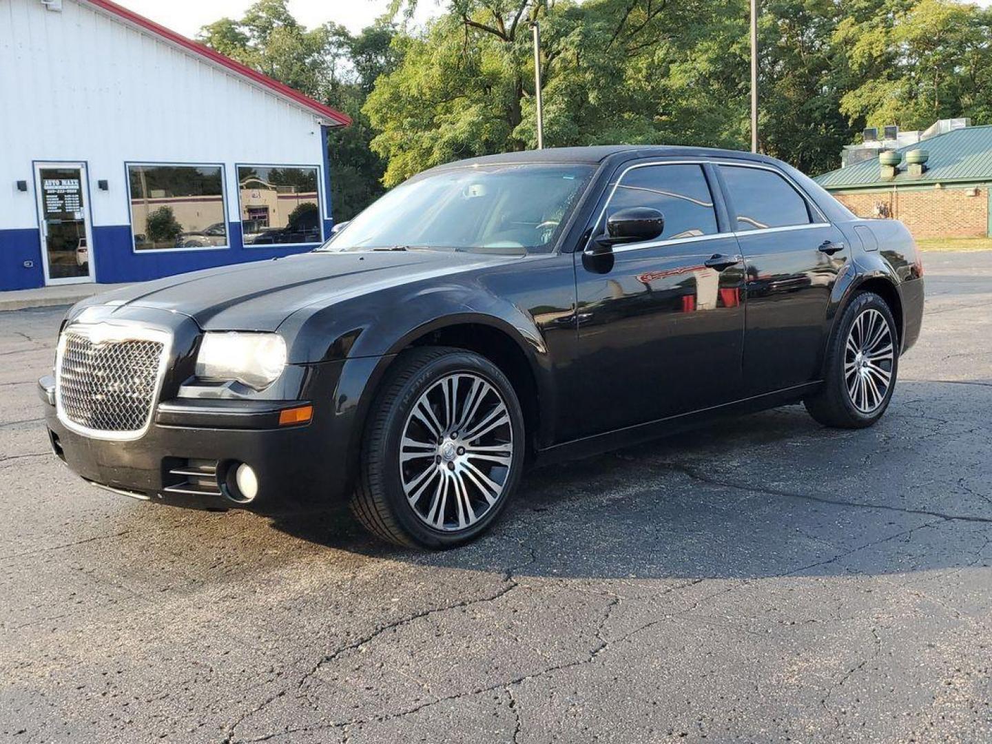 2010 Black Clearcoat /Dark Slate Gray Chrysler 300 S V6 (2C3CA2CVXAH) with an 3.5L V6 SOHC 24V engine, 4-Speed Automatic transmission, located at 6064 Gull Rd, Kalamazoo, MI, 49048, (269) 222-0088, 42.328388, -85.512924 - Discover exceptional value and luxury with our 2010 Chrysler 300 S, a premium sedan that combines style, performance, and comfort. Perfectly maintained and featuring a CARFAX Clean Report, this vehicle is ready to deliver a top-notch driving experience.<br><br>Under the hood, the 300 S boasts a robu - Photo#1