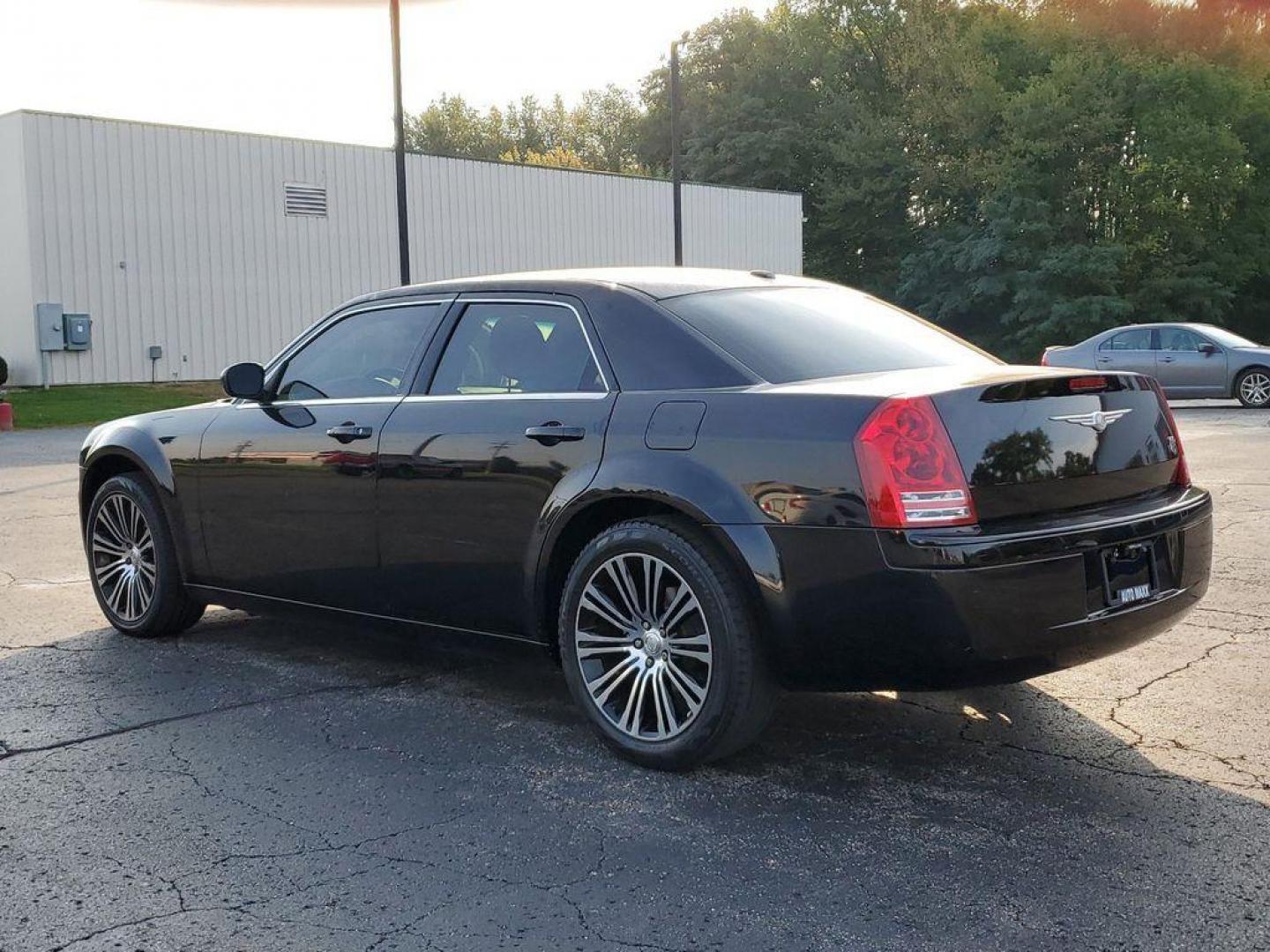 2010 Black Clearcoat /Dark Slate Gray Chrysler 300 S V6 (2C3CA2CVXAH) with an 3.5L V6 SOHC 24V engine, 4-Speed Automatic transmission, located at 6064 Gull Rd, Kalamazoo, MI, 49048, (269) 222-0088, 42.328388, -85.512924 - Discover exceptional value and luxury with our 2010 Chrysler 300 S, a premium sedan that combines style, performance, and comfort. Perfectly maintained and featuring a CARFAX Clean Report, this vehicle is ready to deliver a top-notch driving experience.<br><br>Under the hood, the 300 S boasts a robu - Photo#2