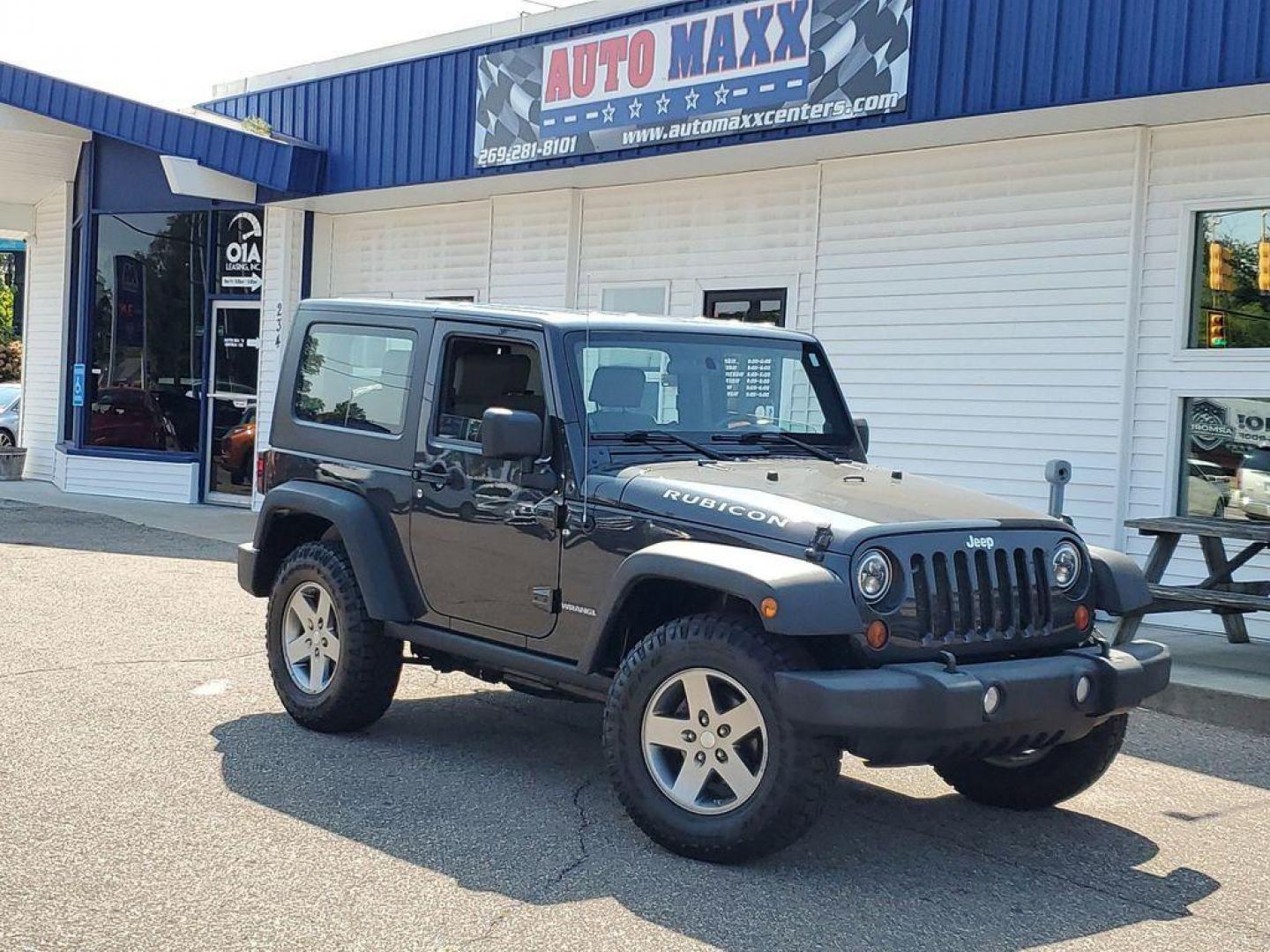 2010 Gray /Dark Khaki/Medium Khaki Jeep Wrangler Rubicon 4WD (1J4BA6D15AL) with an 3.8L V6 OHV 12V engine, 4-speed automatic transmission, located at 234 Columbia Ave, Battle Creek, MI, 49015, (269) 222-0088, 42.298264, -85.192543 - <b>Vehicle Details</b><br>Introducing a robust and reliable 2010 Jeep Wrangler Rubicon, now available at our dealership. This exceptional vehicle boasts a powerful V6, 3.8L engine and a dependable 4WD system, making it the ideal choice for both off-road adventures and daily commutes. The Wrangler Ru - Photo#0