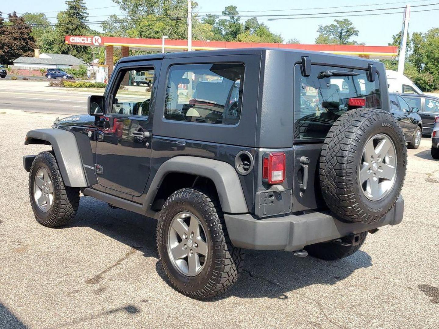 2010 Gray /Dark Khaki/Medium Khaki Jeep Wrangler Rubicon 4WD (1J4BA6D15AL) with an 3.8L V6 OHV 12V engine, 4-speed automatic transmission, located at 234 Columbia Ave, Battle Creek, MI, 49015, (269) 222-0088, 42.298264, -85.192543 - <b>Vehicle Details</b><br>Introducing a robust and reliable 2010 Jeep Wrangler Rubicon, now available at our dealership. This exceptional vehicle boasts a powerful V6, 3.8L engine and a dependable 4WD system, making it the ideal choice for both off-road adventures and daily commutes. The Wrangler Ru - Photo#2