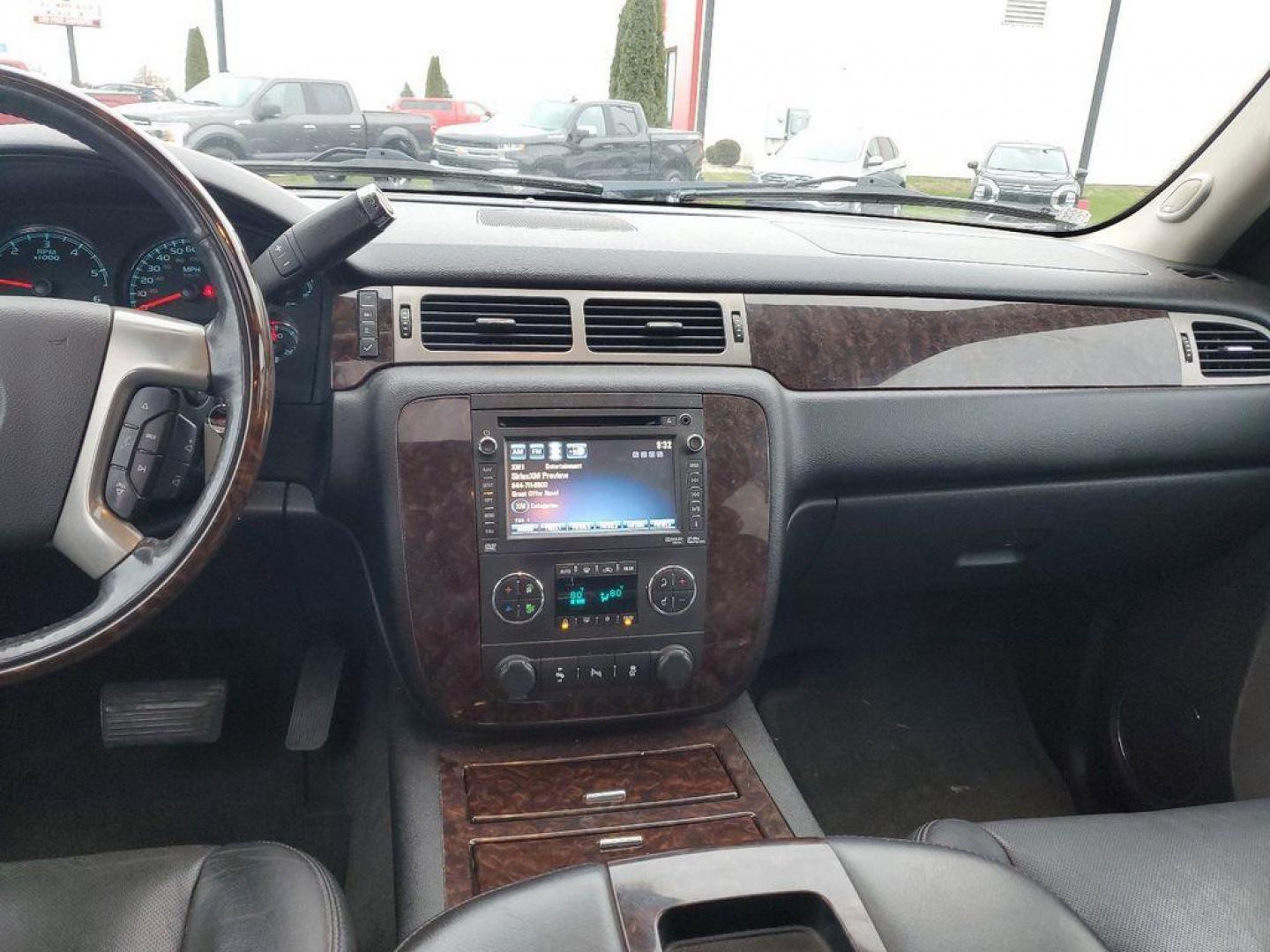 2012 Onyx Black /Ebony GMC Yukon Denali XL 4WD (1GKS2MEF8CR) with an 6.2L V8 OHV 16V engine, 6-Speed Automatic transmission, located at 6064 Gull Rd, Kalamazoo, MI, 49048, (269) 222-0088, 42.328388, -85.512924 - Introducing the 2012 GMC Yukon XL 1500 Denali, a powerhouse of luxury and performance. This exceptional SUV combines rugged capability with refined elegance, making it an ideal choice for families and adventurers alike. Under the hood, you'll find a robust V8, 6.2L engine, offering impressive power - Photo#14