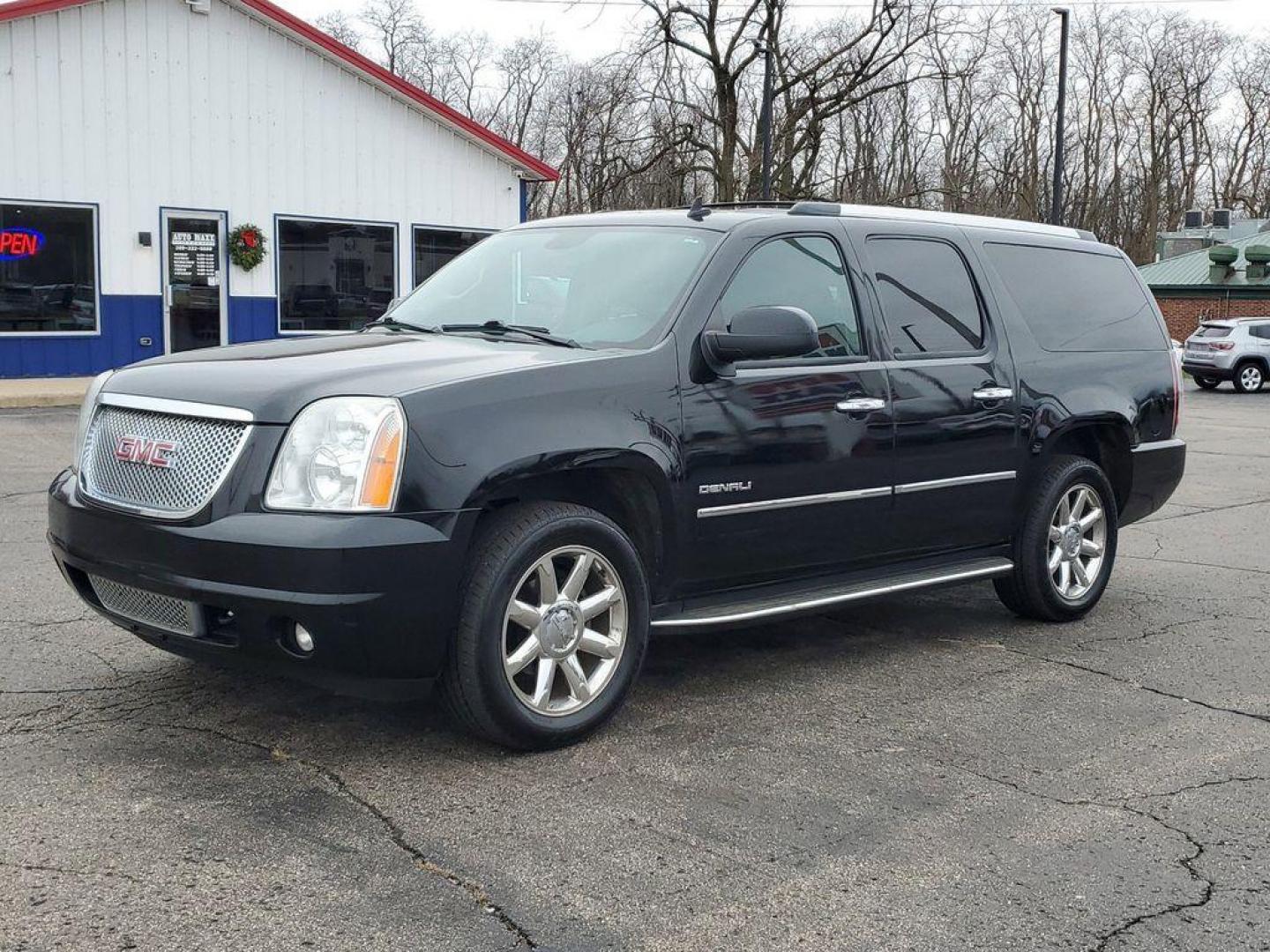 2012 Onyx Black /Ebony GMC Yukon Denali XL 4WD (1GKS2MEF8CR) with an 6.2L V8 OHV 16V engine, 6-Speed Automatic transmission, located at 6064 Gull Rd, Kalamazoo, MI, 49048, (269) 222-0088, 42.328388, -85.512924 - Introducing the 2012 GMC Yukon XL 1500 Denali, a powerhouse of luxury and performance. This exceptional SUV combines rugged capability with refined elegance, making it an ideal choice for families and adventurers alike. Under the hood, you'll find a robust V8, 6.2L engine, offering impressive power - Photo#1