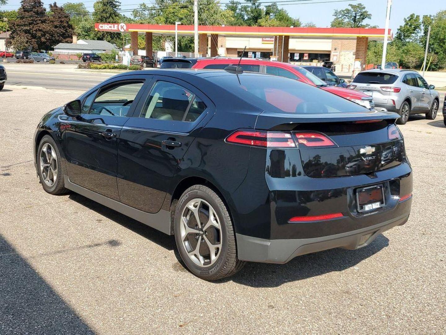 2015 Black /Jet Black/Dark Accents Chevrolet Volt Premium (1G1RB6E47FU) with an ELECTRIC engine, Continuously Variable Transmission transmission, located at 234 Columbia Ave, Battle Creek, MI, 49015, (269) 222-0088, 42.298264, -85.192543 - <b>Vehicle Details</b><br>Discover exceptional efficiency and premium comfort with our 2015 Chevrolet Volt Premium, now available at our dealership. This forward-thinking hybrid vehicle combines an electric motor with front-wheel drive, delivering an impressive blend of performance and eco-friendlin - Photo#2