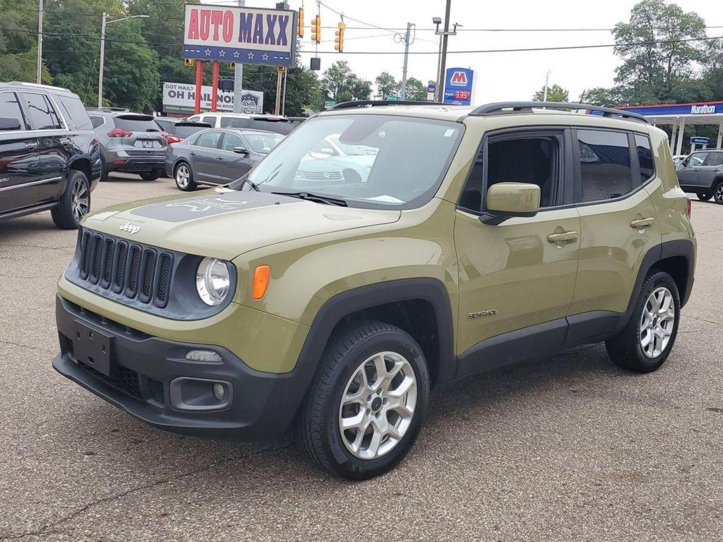 2015 Commando /Black Jeep Renegade Latitude 4WD (ZACCJBBT2FP) with an 2.4L L4 engine, 6-Speed Manual transmission, located at 234 Columbia Ave, Battle Creek, MI, 49015, (269) 222-0088, 42.298264, -85.192543 - <b>Vehicle Details</b><br>Experience the perfect blend of rugged capability and modern convenience with this 2015 Jeep Renegade Latitude. Equipped with a robust 4WD system, this versatile SUV is ready to tackle any terrain, making it an ideal choice for both urban adventures and off-road excursions. - Photo#3