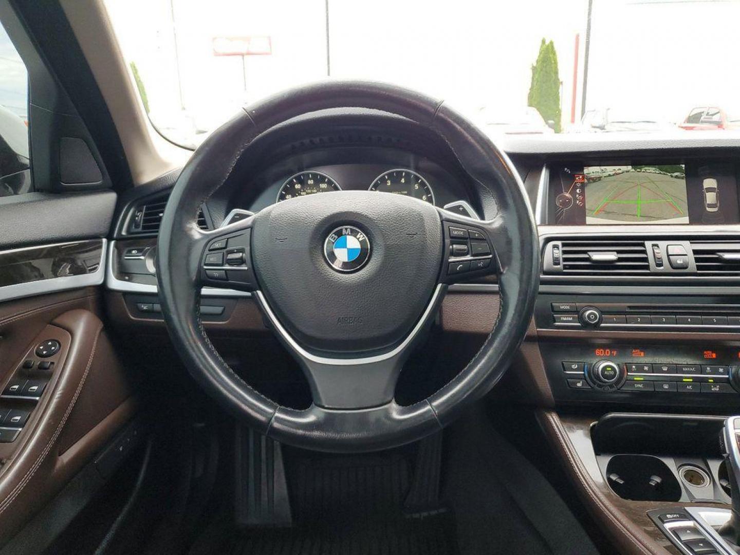 2016 Alpine White /Venetian Beige/Black w/Exclusive Stitching BMW 5-Series 535i xDrive (WBA5B3C50GG) with an 3.0L L6 DOHC 24V engine, 8A transmission, located at 6064 Gull Rd, Kalamazoo, MI, 49048, (269) 222-0088, 42.328388, -85.512924 - <b>Vehicle Details</b><br>Experience the perfect blend of performance, luxury, and technology with this exceptional 2016 BMW 5 Series 535i xDrive. This sophisticated sedan is powered by a robust L6, 3.0L engine, delivering exhilarating performance and remarkable efficiency. The xDrive all-wheel-driv - Photo#12