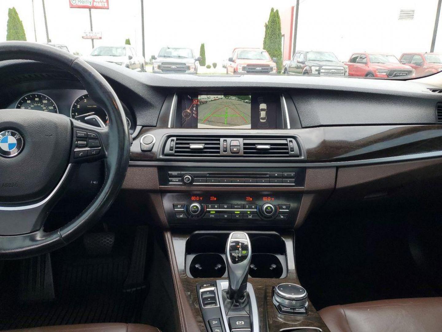 2016 Alpine White /Venetian Beige/Black w/Exclusive Stitching BMW 5-Series 535i xDrive (WBA5B3C50GG) with an 3.0L L6 DOHC 24V engine, 8A transmission, located at 6064 Gull Rd, Kalamazoo, MI, 49048, (269) 222-0088, 42.328388, -85.512924 - <b>Vehicle Details</b><br>Experience the perfect blend of performance, luxury, and technology with this exceptional 2016 BMW 5 Series 535i xDrive. This sophisticated sedan is powered by a robust L6, 3.0L engine, delivering exhilarating performance and remarkable efficiency. The xDrive all-wheel-driv - Photo#13