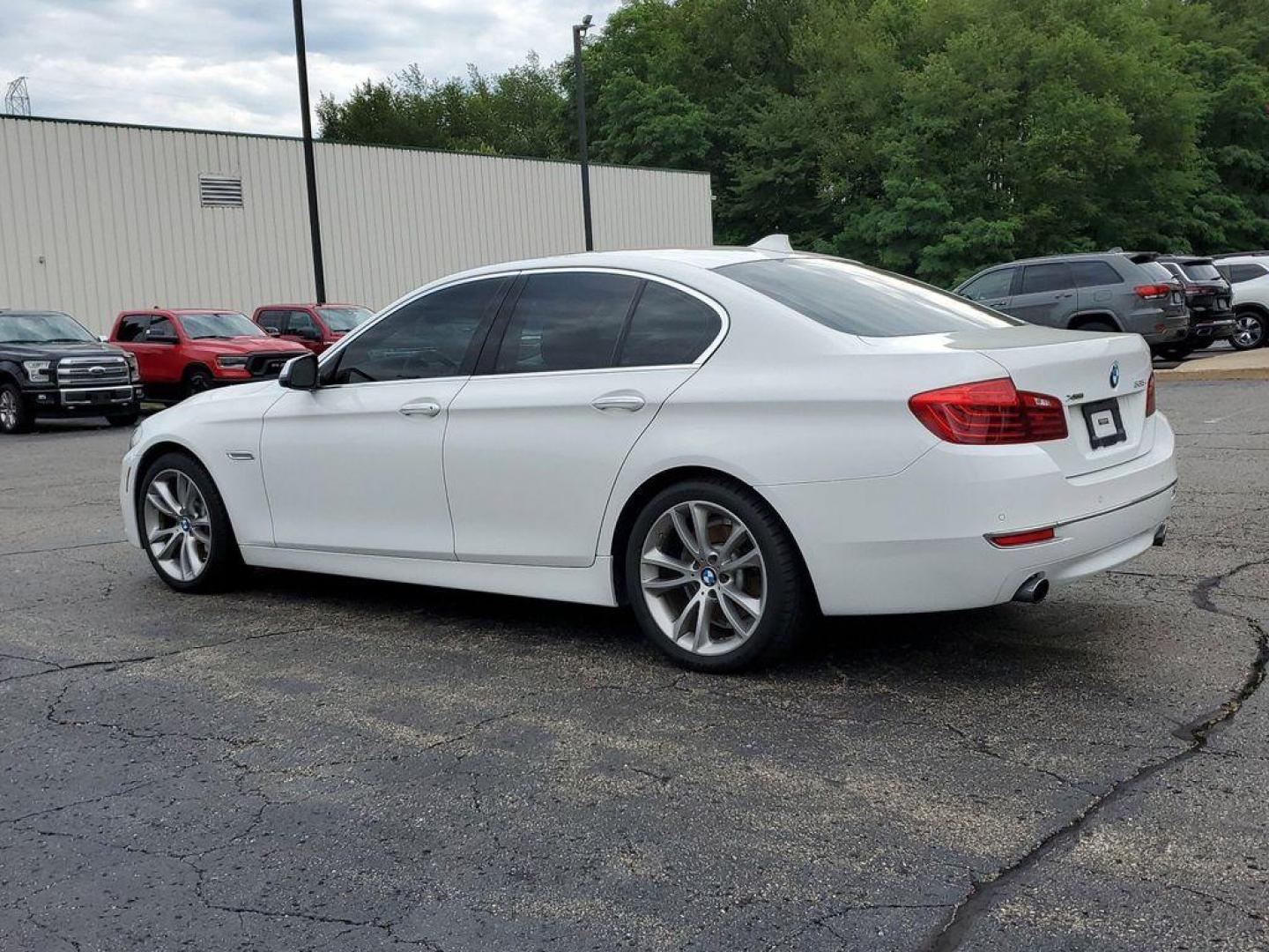 2016 Alpine White /Venetian Beige/Black w/Exclusive Stitching BMW 5-Series 535i xDrive (WBA5B3C50GG) with an 3.0L L6 DOHC 24V engine, 8A transmission, located at 6064 Gull Rd, Kalamazoo, MI, 49048, (269) 222-0088, 42.328388, -85.512924 - <b>Vehicle Details</b><br>Experience the perfect blend of performance, luxury, and technology with this exceptional 2016 BMW 5 Series 535i xDrive. This sophisticated sedan is powered by a robust L6, 3.0L engine, delivering exhilarating performance and remarkable efficiency. The xDrive all-wheel-driv - Photo#2