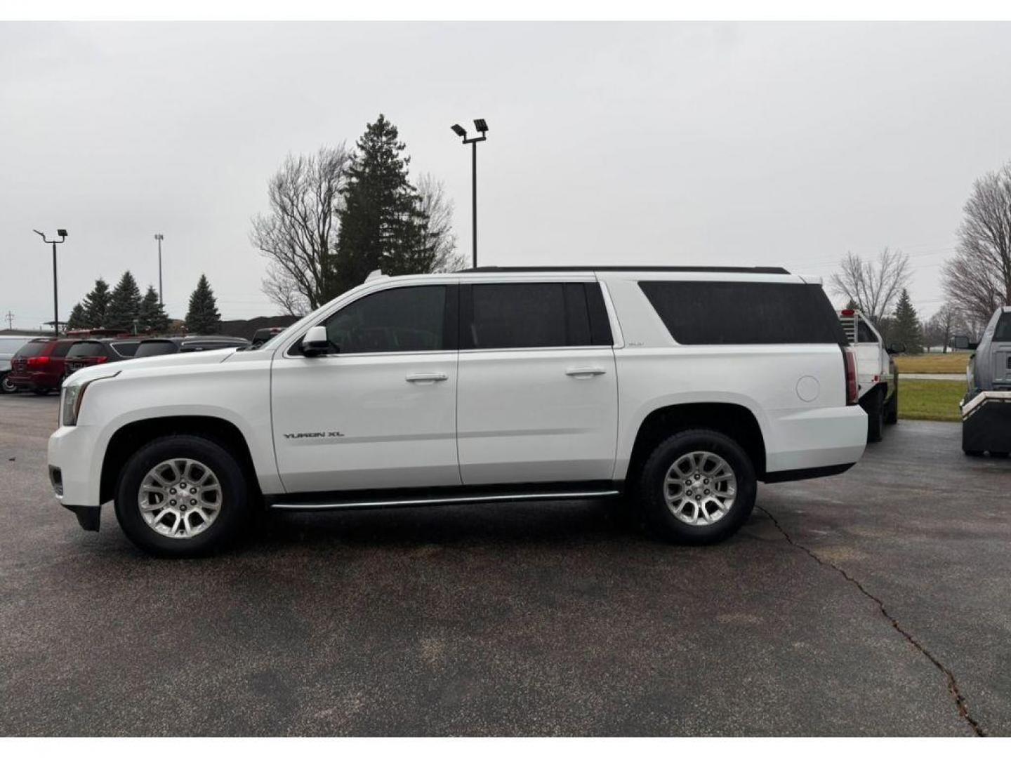 2017 Summit White /Cocoa/Dune GMC Yukon XL SLT 4WD (1GKS2GKC3HR) with an 5.3L V8 OHV 16V engine, 6A transmission, located at 6064 Gull Rd, Kalamazoo, MI, 49048, (269) 222-0088, 42.328388, -85.512924 - For sale at our dealership is a dependable and spacious 2017 GMC Yukon XL 1500 SLT with 4WD, perfect for families and adventure seekers alike. Under the hood, youll find a robust V8, 5.3L engine, offering a powerful yet smooth driving experience. This GMC Yukon XL is equipped with a suite of advance - Photo#0