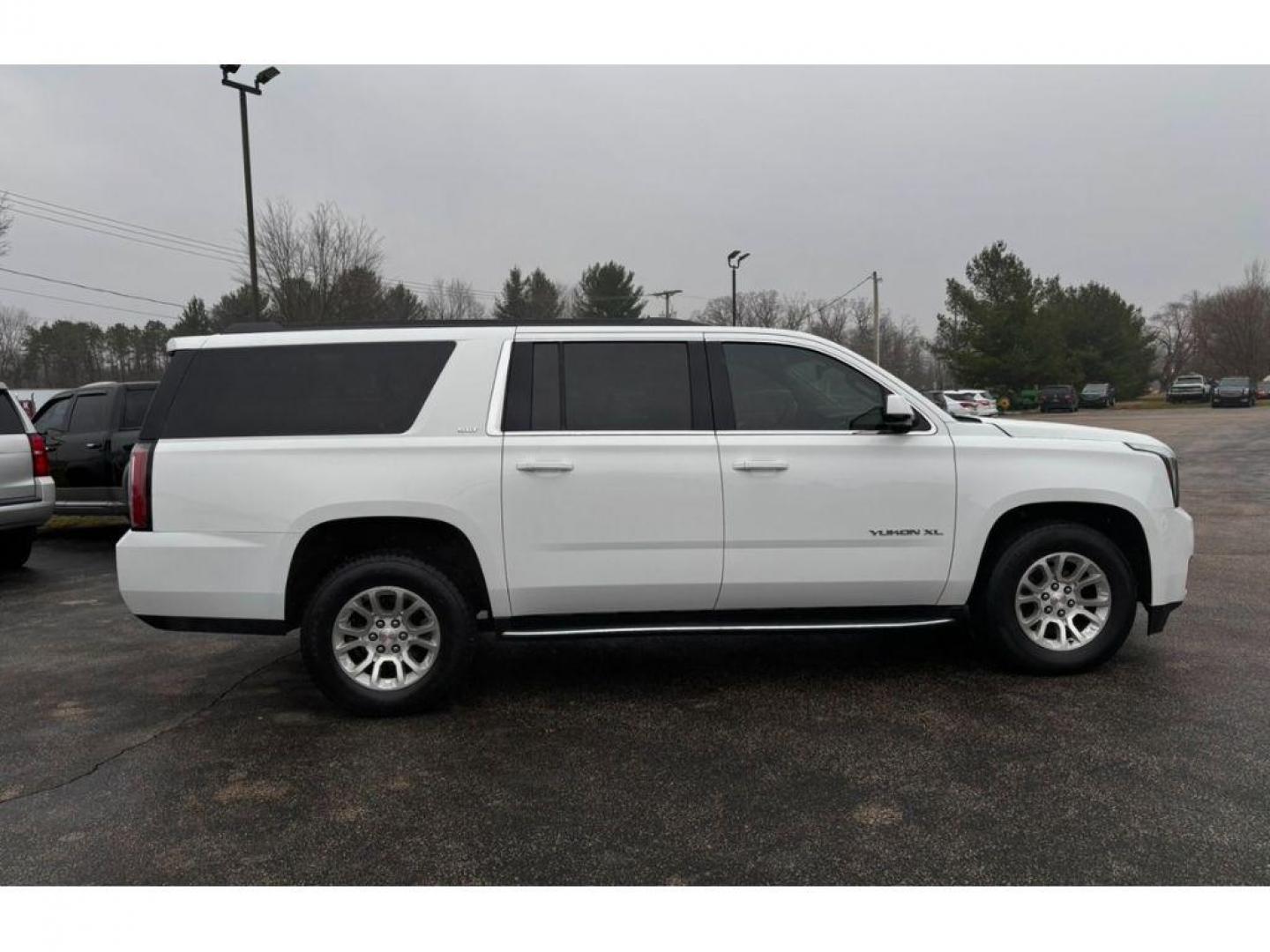 2017 Summit White /Cocoa/Dune GMC Yukon XL SLT 4WD (1GKS2GKC3HR) with an 5.3L V8 OHV 16V engine, 6A transmission, located at 6064 Gull Rd, Kalamazoo, MI, 49048, (269) 222-0088, 42.328388, -85.512924 - For sale at our dealership is a dependable and spacious 2017 GMC Yukon XL 1500 SLT with 4WD, perfect for families and adventure seekers alike. Under the hood, youll find a robust V8, 5.3L engine, offering a powerful yet smooth driving experience. This GMC Yukon XL is equipped with a suite of advance - Photo#1