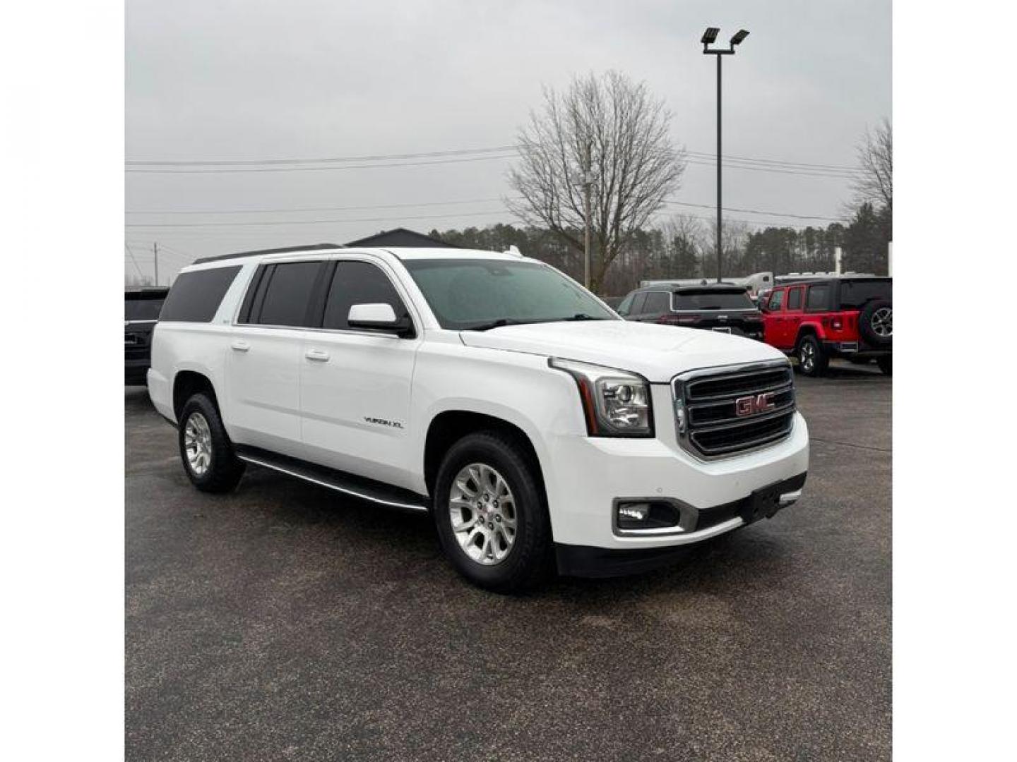 2017 Summit White /Cocoa/Dune GMC Yukon XL SLT 4WD (1GKS2GKC3HR) with an 5.3L V8 OHV 16V engine, 6A transmission, located at 6064 Gull Rd, Kalamazoo, MI, 49048, (269) 222-0088, 42.328388, -85.512924 - For sale at our dealership is a dependable and spacious 2017 GMC Yukon XL 1500 SLT with 4WD, perfect for families and adventure seekers alike. Under the hood, youll find a robust V8, 5.3L engine, offering a powerful yet smooth driving experience. This GMC Yukon XL is equipped with a suite of advance - Photo#2