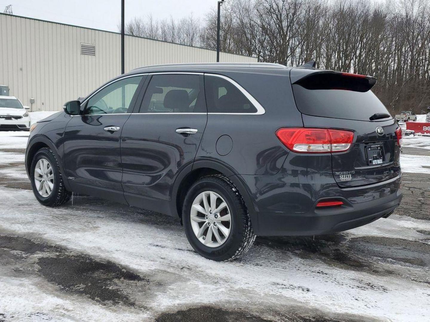 2017 Platinum Graphite /Satin Black Kia Sorento LX AWD (5XYPGDA31HG) with an 2.4L L4 DOHC 16V engine, 6A transmission, located at 6064 Gull Rd, Kalamazoo, MI, 49048, (269) 222-0088, 42.328388, -85.512924 - <b>Summary</b><br>Power Moonroof LEATHER<br><br><b>Vehicle Details</b><br>Discover the exceptional reliability and versatility of the 2017 Kia Sorento LX AWD, a perfect blend of performance and practicality. Equipped with a fuel-efficient 2.4L 4-cylinder engine, this Kia Sorento delivers a smooth an - Photo#2