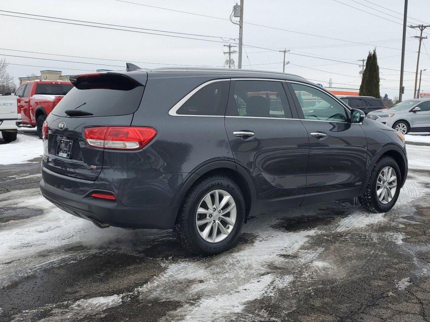 2017 Platinum Graphite /Satin Black Kia Sorento LX AWD (5XYPGDA31HG) with an 2.4L L4 DOHC 16V engine, 6A transmission, located at 6064 Gull Rd, Kalamazoo, MI, 49048, (269) 222-0088, 42.328388, -85.512924 - <b>Summary</b><br>Power Moonroof LEATHER<br><br><b>Vehicle Details</b><br>Discover the exceptional reliability and versatility of the 2017 Kia Sorento LX AWD, a perfect blend of performance and practicality. Equipped with a fuel-efficient 2.4L 4-cylinder engine, this Kia Sorento delivers a smooth an - Photo#3