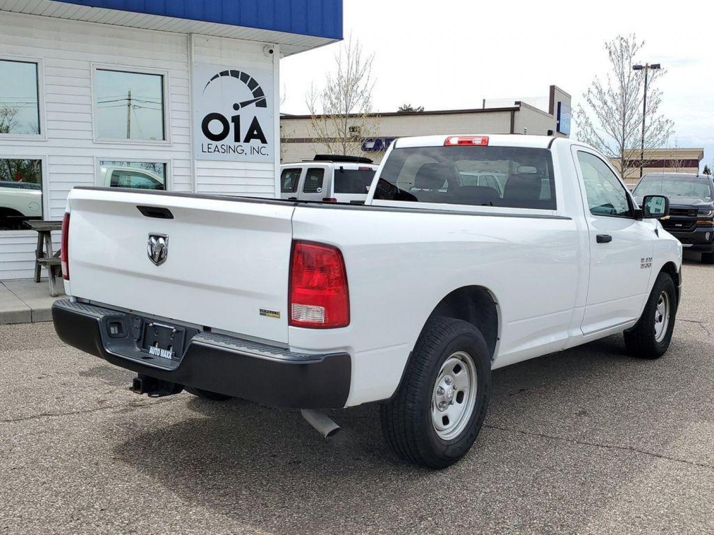 2017 Bright White Clearcoat /Diesel Gray/Black RAM 1500 Tradesman Regular Cab LWB 2WD (3C6JR6DG6HG) with an 3.6L V6 DOHC 24V FFV engine, 8A transmission, located at 234 Columbia Ave, Battle Creek, MI, 49015, (269) 222-0088, 42.298264, -85.192543 - <b>Vehicle Details</b><br>This 2017 Ram 1500 Tradesman is the perfect workhorse truck for any job. With 101,283 miles on the odometer, this reliable vehicle is equipped with rear-wheel drive and a powerful V6, 3.6L engine. Stay connected on the go with hands-free Bluetooth technology, allowing you - Photo#1