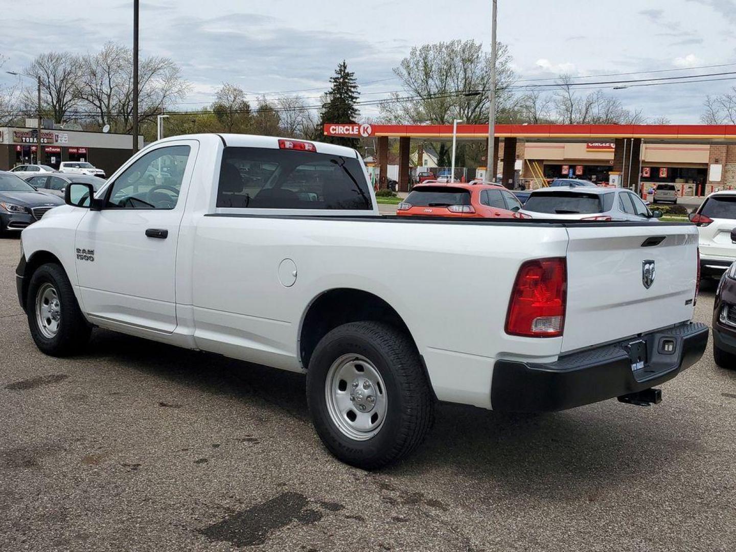 2017 Bright White Clearcoat /Diesel Gray/Black RAM 1500 Tradesman Regular Cab LWB 2WD (3C6JR6DG6HG) with an 3.6L V6 DOHC 24V FFV engine, 8A transmission, located at 234 Columbia Ave, Battle Creek, MI, 49015, (269) 222-0088, 42.298264, -85.192543 - <b>Vehicle Details</b><br>This 2017 Ram 1500 Tradesman is the perfect workhorse truck for any job. With 101,283 miles on the odometer, this reliable vehicle is equipped with rear-wheel drive and a powerful V6, 3.6L engine. Stay connected on the go with hands-free Bluetooth technology, allowing you - Photo#2