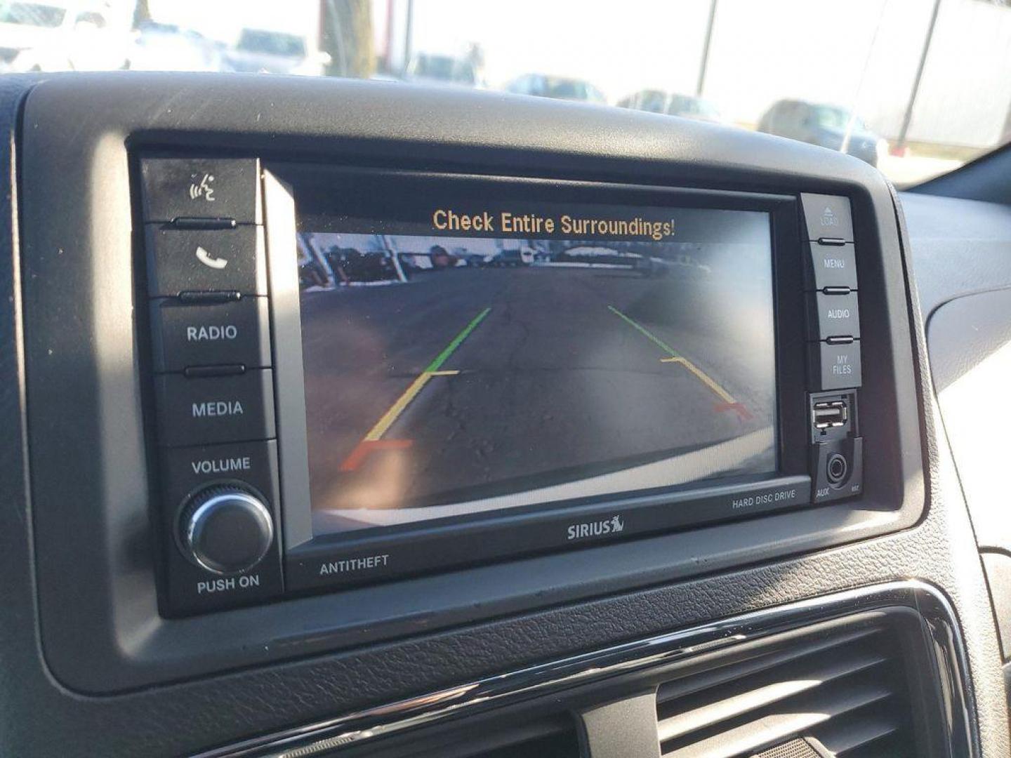 2018 White Knuckle Clearcoat /BLACK Dodge Grand Caravan SE (2C4RDGBG7JR) with an 3.6L V6 DOHC 24V engine, 6A transmission, located at 6064 Gull Rd, Kalamazoo, MI, 49048, (269) 222-0088, 42.328388, -85.512924 - Discover the perfect blend of power, versatility, and comfort with this stunning 2018 Dodge Grand Caravan SE! Equipped with a robust V6, 3.6L engine and front-wheel drive, this minivan is engineered to handle your everyday adventures with ease and efficiency. Whether you're navigating city streets o - Photo#23