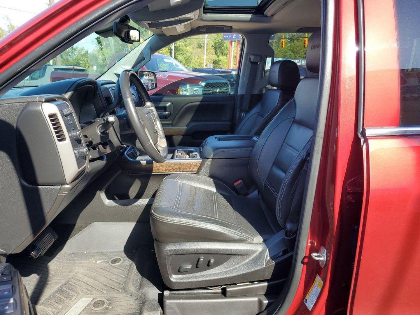 2018 Red Quartz Tintcoat /Jet Black GMC Sierra 1500 Denali Crew Cab Long Box 4WD (3GTU2PEJ9JG) with an 6.2L V8 OHV 16V engine, 6A transmission, located at 234 Columbia Ave, Battle Creek, MI, 49015, (269) 222-0088, 42.298264, -85.192543 - <b>Vehicle Details</b><br>Discover the power and luxury of the 2018 GMC Sierra 1500 Denali at our dealership. This pre-owned gem comes equipped with a robust V8, 6.2L engine and 4WD, ensuring you have the muscle and traction needed for any adventure or tough job. Step inside to experience true com - Photo#9