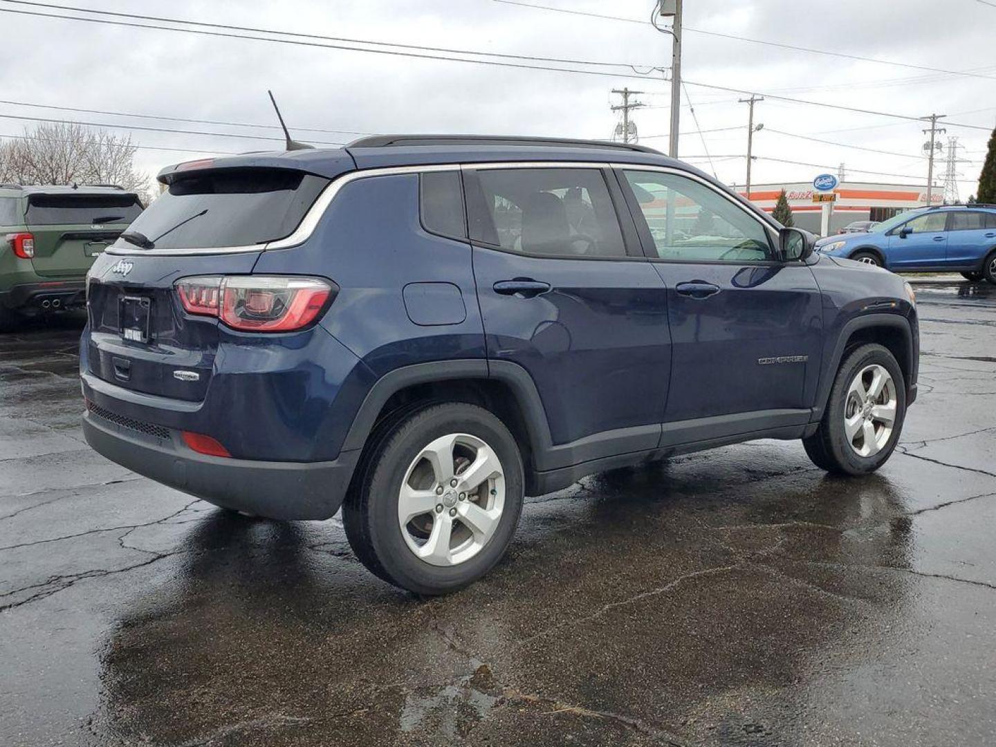 2018 BLUE /Black Jeep Compass Sport FWD (3C4NJCBBXJT) with an 2.4L L4 DOHC 16V engine, Automatic transmission, located at 6064 Gull Rd, Kalamazoo, MI, 49048, (269) 222-0088, 42.328388, -85.512924 - Discover adventure and style with this stunning 2018 Jeep Compass Latitude, now available at our dealership. Perfect for those who seek reliability and modern features, this SUV is designed to enhance your driving experience. Equipped with a fuel-efficient 4-cylinder, 2.4L engine and Front-Wheel Dri - Photo#3