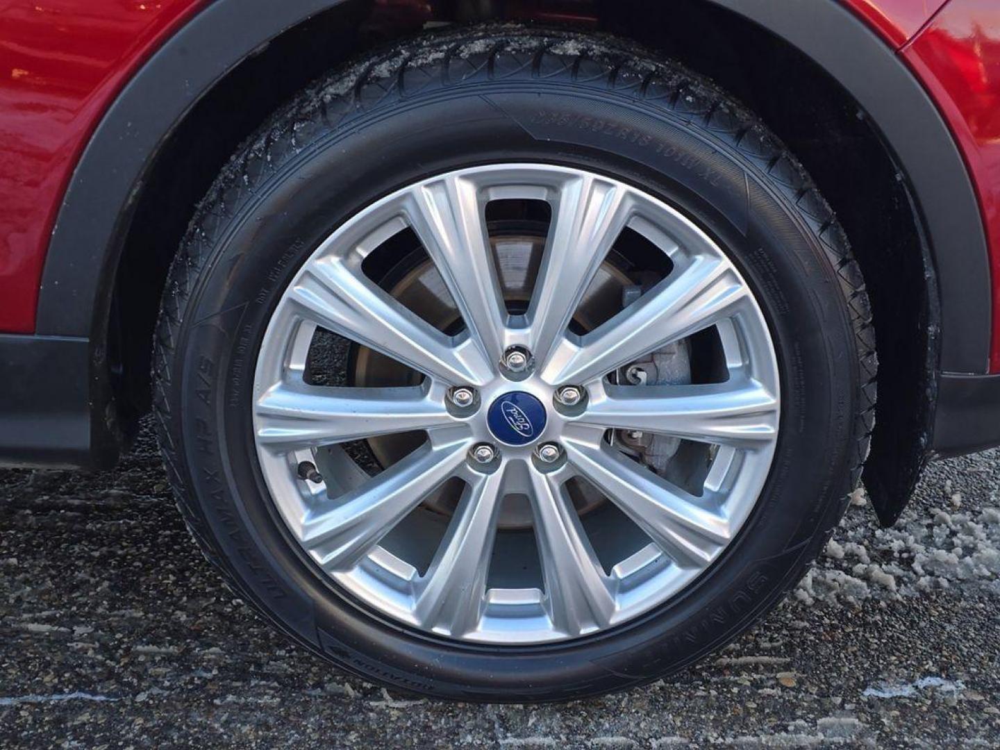 2019 Ruby Red Metallic Tinted Clearcoat /Charcoal Black Ford Escape SEL 4WD (1FMCU9HD2KU) with an 1.5L L4 DOHC 16V engine, 6A transmission, located at 234 Columbia Ave, Battle Creek, MI, 49015, (269) 222-0088, 42.298264, -85.192543 - When you encounter slick or muddy roads, you can engage the four wheel drive on the Ford Escape and drive with confidence. This small suv comes equipped with Android Auto for seamless smartphone integration on the road. Apple CarPlay: Seamless smartphone integration for this vehicle - stay connected - Photo#4