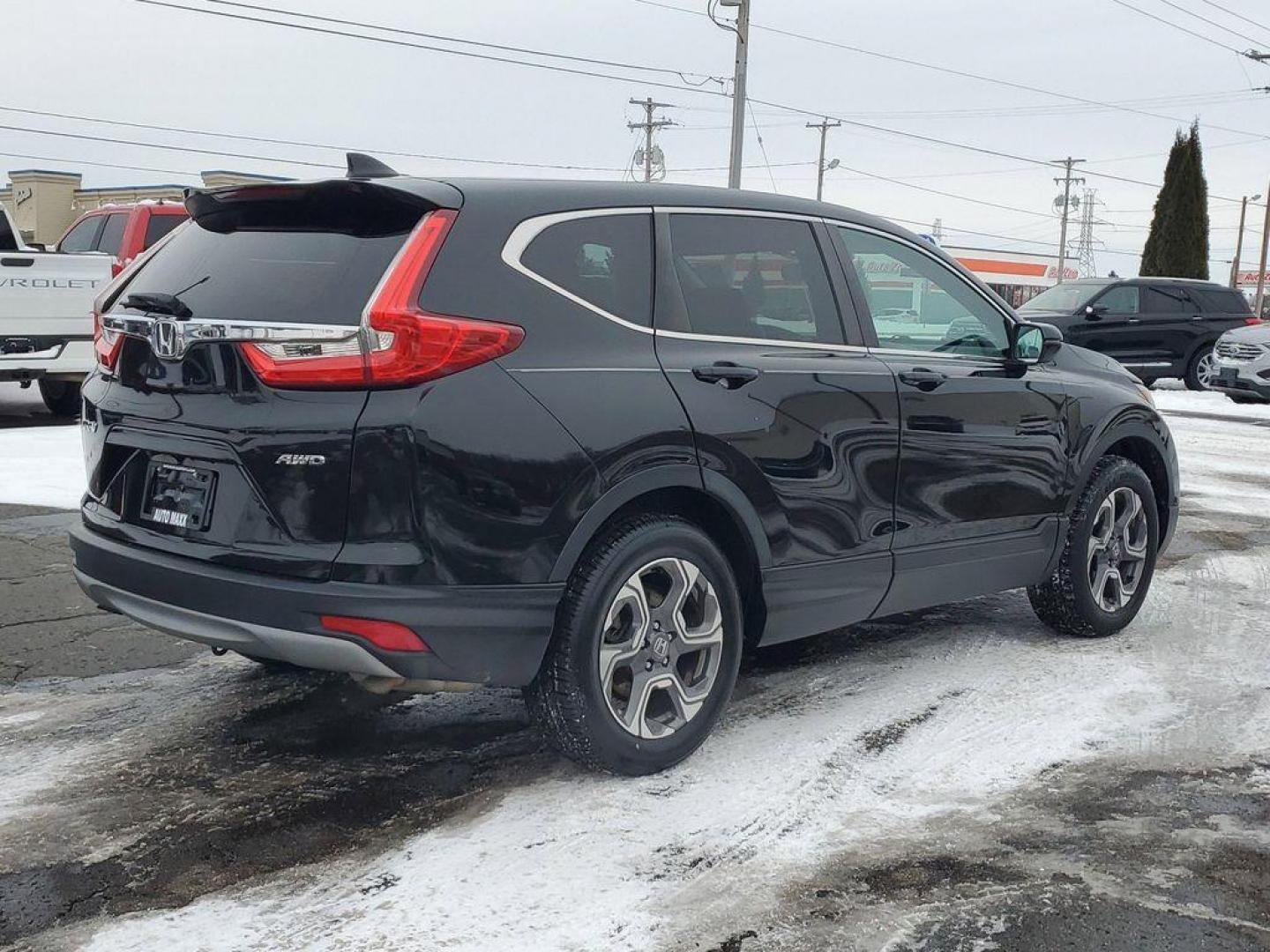 2019 BLACK /GREY Honda CR-V EX AWD (7FARW2H5XKE) with an 1.5L L4 16V DOHC TURBO engine, CVT transmission, located at 6064 Gull Rd, Kalamazoo, MI, 49048, (269) 222-0088, 42.328388, -85.512924 - Unleash your adventurous spirit with this impressive 2019 Honda CR-V EX, a perfect blend of style, performance, and cutting-edge technology! Powered by a robust 4-cylinder, 1.5L turbocharged engine, this Honda CR-V delivers remarkable efficiency and a dynamic driving experience that makes every jour - Photo#3