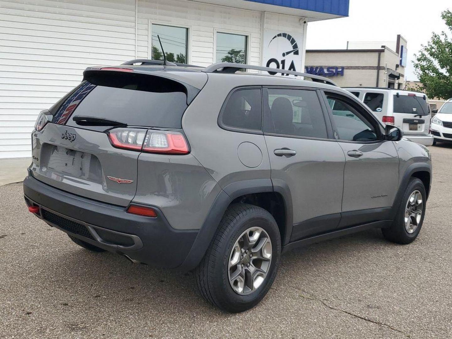 2019 Sting-Gray Clearcoat /Black Jeep Cherokee Trailhawk 4WD (1C4PJMBX3KD) with an 3.2L V6 DOHC 24V engine, 9A transmission, located at 234 Columbia Ave, Battle Creek, MI, 49015, (269) 222-0088, 42.298264, -85.192543 - <b>Vehicle Details</b><br>Introducing the 2019 Jeep Cherokee Trailhawk, a robust and versatile SUV designed to tackle both urban streets and rugged trails with ease. Equipped with a powerful V6, 3.2L engine and an advanced 4WD system, this vehicle delivers exceptional performance and reliability in - Photo#1