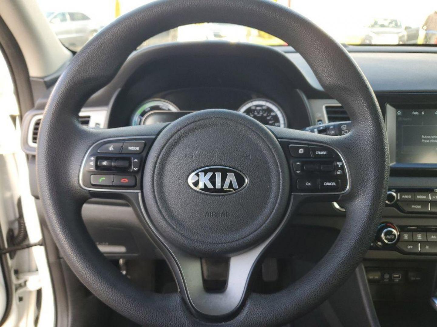 2019 Snow White Pearl /Charcoal Kia Niro LX (KNDCB3LCXK5) with an 1.6L L4 DOHC 16V HYBRID engine, 6A transmission, located at 6064 Gull Rd, Kalamazoo, MI, 49048, (269) 222-0088, 42.328388, -85.512924 - Introducing the 2019 Kia Niro LX, a versatile and efficient compact crossover that seamlessly blends performance with practicality. This model is equipped with a responsive 4-cylinder, 1.6L engine, delivering a balanced combination of power and fuel efficiency, ideal for both city driving and long-d - Photo#16