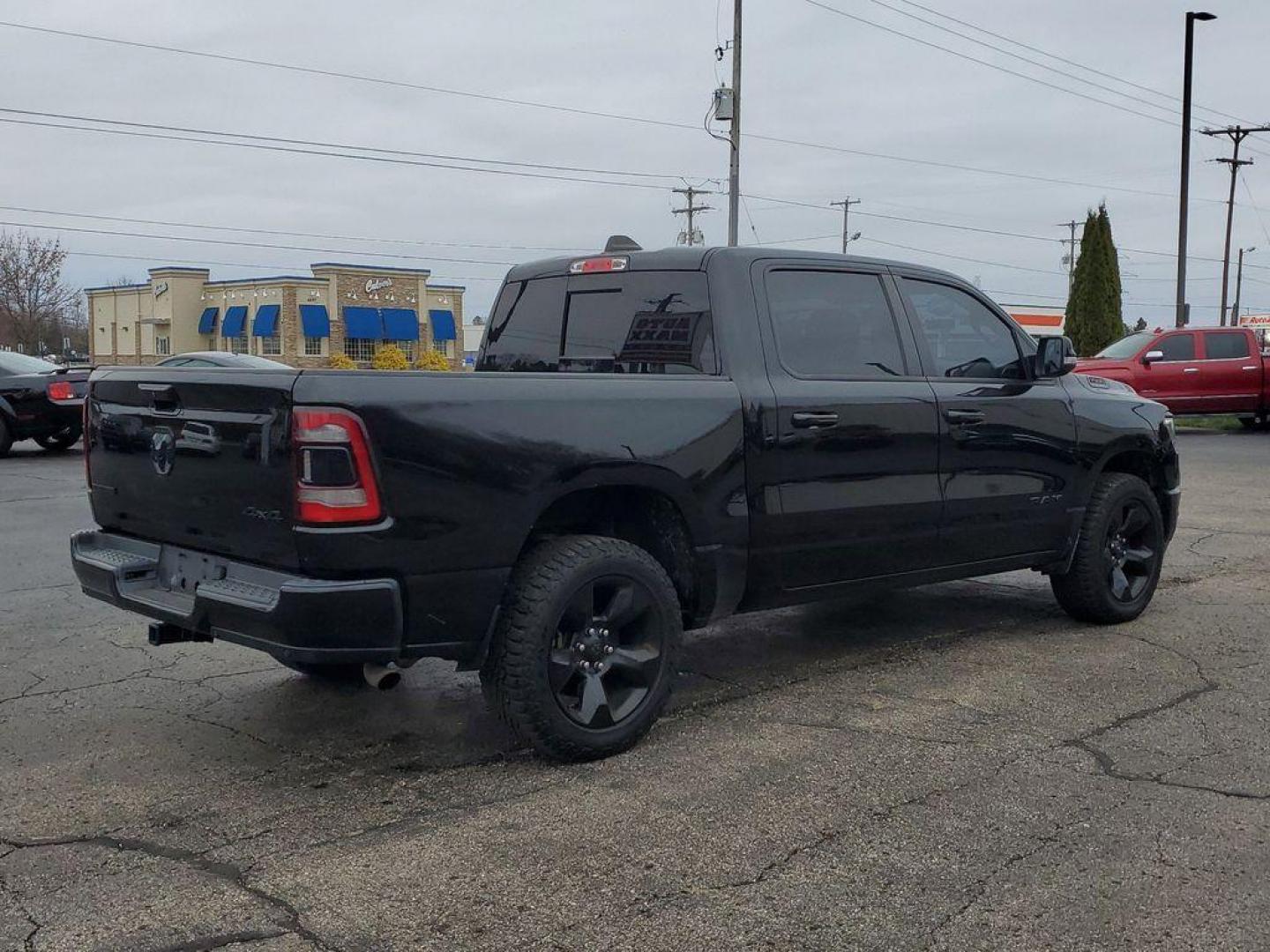 2019 Diamond Black Crystal Pearlcoat /Black RAM 1500 Big Horn Crew Cab SWB 4WD (1C6RRFFG7KN) with an 3.6L V6 DOHC 24V engine, 8A transmission, located at 6064 Gull Rd, Kalamazoo, MI, 49048, (269) 222-0088, 42.328388, -85.512924 - <b>Summary</b><br>Power Moonroof<br><br><b>Vehicle Details</b><br>Step into the driver's seat of power and sophistication with this pristine 2019 Ram 1500 Big Horn/Lone Star! This exceptional truck, boasting an incredible 0 miles, is ready to redefine your driving experience with its robust 4WD and - Photo#3