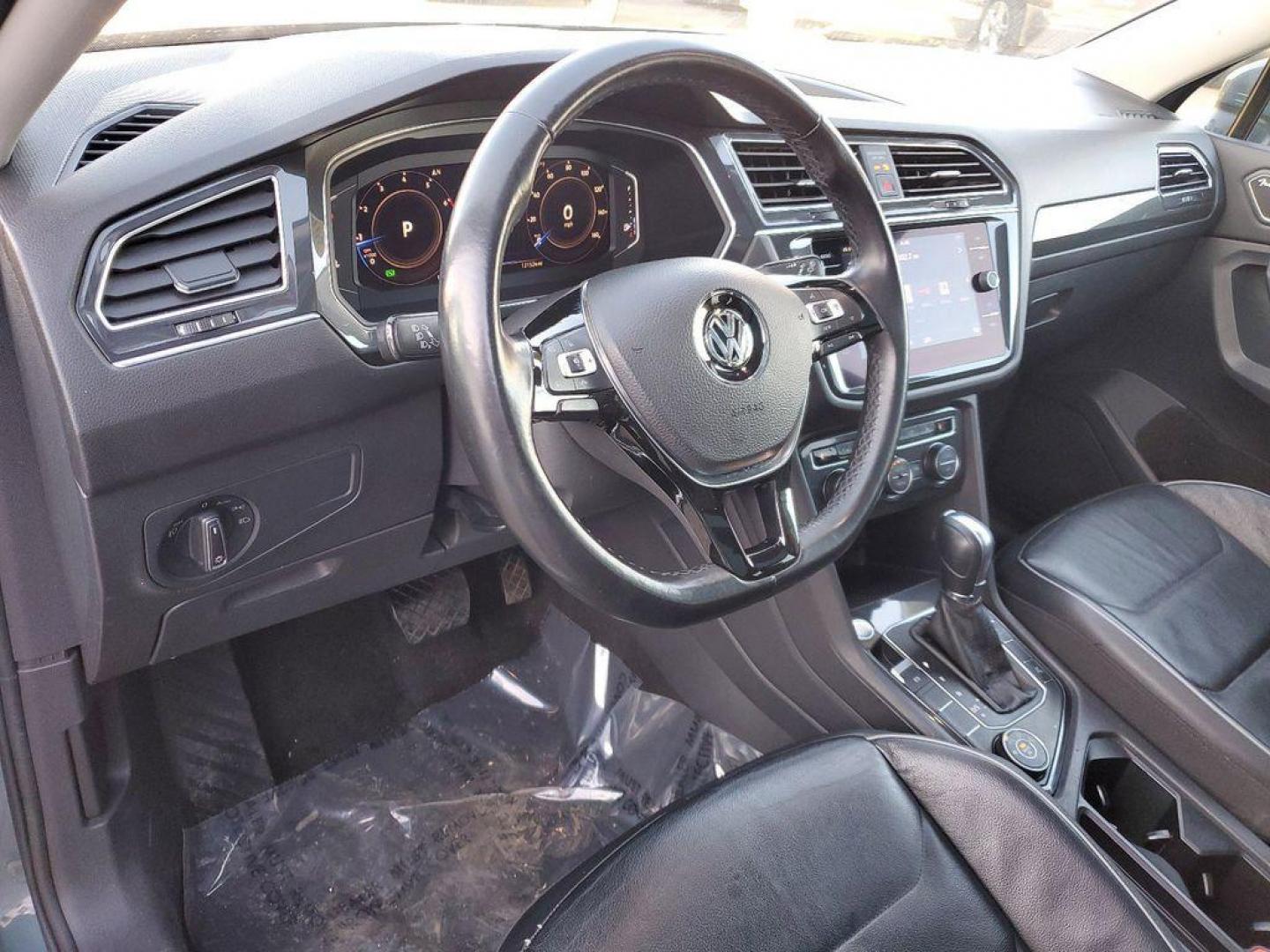 2019 GRAY Volkswagen Tiguan SEL Premium 4Motion (3VV4B7AX6KM) with an 2.0L L4 DOHC 16V TURBO engine, 8A transmission, located at 6064 Gull Rd, Kalamazoo, MI, 49048, (269) 222-0088, 42.328388, -85.512924 - Discover exceptional value and performance with this 2019 Volkswagen Tiguan SEL Premium 4Motion, now available at our dealership. This sophisticated SUV combines style, comfort, and advanced technology, making it the perfect choice for families and adventurers alike.<br><br>Equipped with a reliable - Photo#13