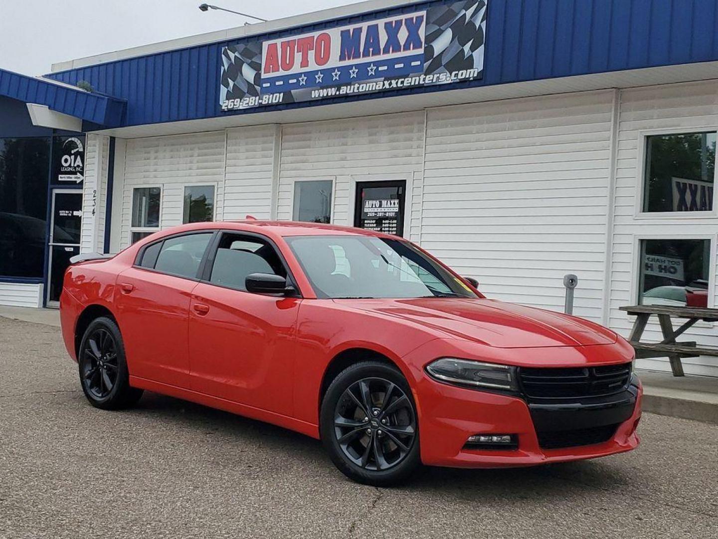 2020 Torred Clearcoat /Black Dodge Charger SXT AWD (2C3CDXJG7LH) with an 3.6L V6 DOHC 24V engine, 8A transmission, located at 234 Columbia Ave, Battle Creek, MI, 49015, (269) 222-0088, 42.298264, -85.192543 - <b>Vehicle Details</b><br>Looking for a dynamic blend of performance and comfort? Check out this 2020 Dodge Charger SXT, equipped with All-Wheel Drive and a powerful V6, 3.6L engine. This standout sedan balances thrilling acceleration with precise handling, making every drive an adventure. Inside, - Photo#0