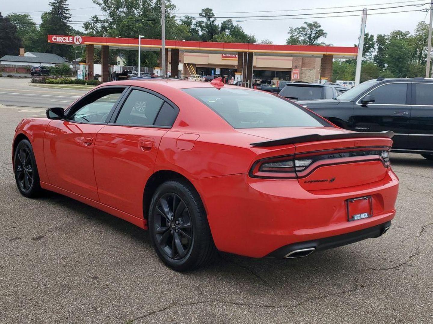 2020 Torred Clearcoat /Black Dodge Charger SXT AWD (2C3CDXJG7LH) with an 3.6L V6 DOHC 24V engine, 8A transmission, located at 234 Columbia Ave, Battle Creek, MI, 49015, (269) 222-0088, 42.298264, -85.192543 - <b>Vehicle Details</b><br>Looking for a dynamic blend of performance and comfort? Check out this 2020 Dodge Charger SXT, equipped with All-Wheel Drive and a powerful V6, 3.6L engine. This standout sedan balances thrilling acceleration with precise handling, making every drive an adventure. Inside, - Photo#2