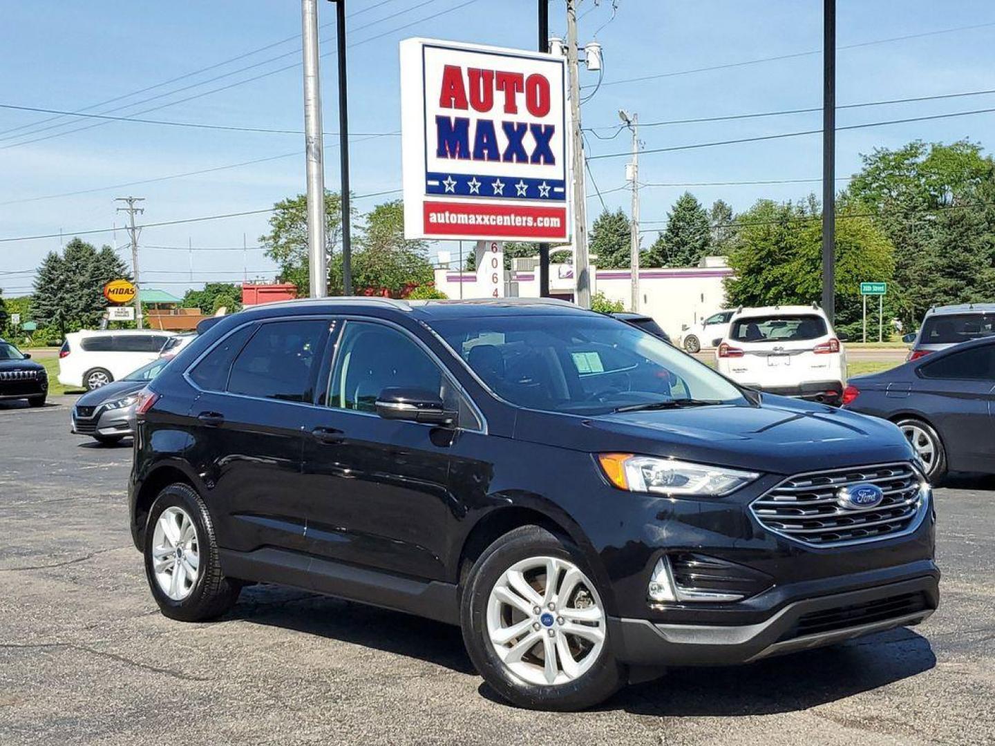 2020 Agate Black /Ebony Ford Edge SEL AWD (2FMPK4J9XLB) with an 2.0L L4 DOHC 16V engine, 6A transmission, located at 6064 Gull Rd, Kalamazoo, MI, 49048, (269) 222-0088, 42.328388, -85.512924 - Discover the perfect blend of performance, comfort, and advanced technology in the 2020 Ford Edge SEL, equipped with an efficient L4, 2.0L engine and All-Wheel Drive (AWD) system. This reliable midsize SUV offers a robust driving experience, ideal for both city commutes and adventurous getaways.<br> - Photo#0