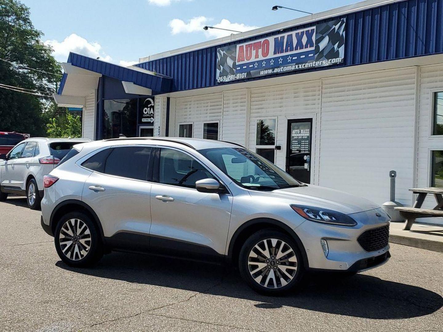 2020 Ingot Silver Metallic /Ebony Black Ford Escape Titanium 4WD (1FMCU9J93LU) with an 2.0L L4 DOHC 16V engine, 6A transmission, located at 234 Columbia Ave, Battle Creek, MI, 49015, (269) 222-0088, 42.298264, -85.192543 - Experience the epitome of sophistication and performance with this 2020 Ford Escape Titanium, designed to elevate your driving experience. This model comes equipped with a robust L4, 2.0L engine, ensuring a powerful yet efficient ride. The advanced 4WD system offers exceptional traction and stabilit - Photo#0