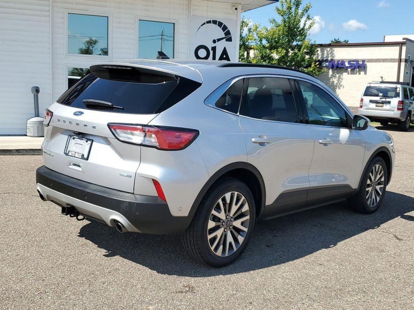 2020 Ingot Silver Metallic /Ebony Black Ford Escape Titanium 4WD (1FMCU9J93LU) with an 2.0L L4 DOHC 16V engine, 6A transmission, located at 234 Columbia Ave, Battle Creek, MI, 49015, (269) 222-0088, 42.298264, -85.192543 - Experience the epitome of sophistication and performance with this 2020 Ford Escape Titanium, designed to elevate your driving experience. This model comes equipped with a robust L4, 2.0L engine, ensuring a powerful yet efficient ride. The advanced 4WD system offers exceptional traction and stabilit - Photo#1