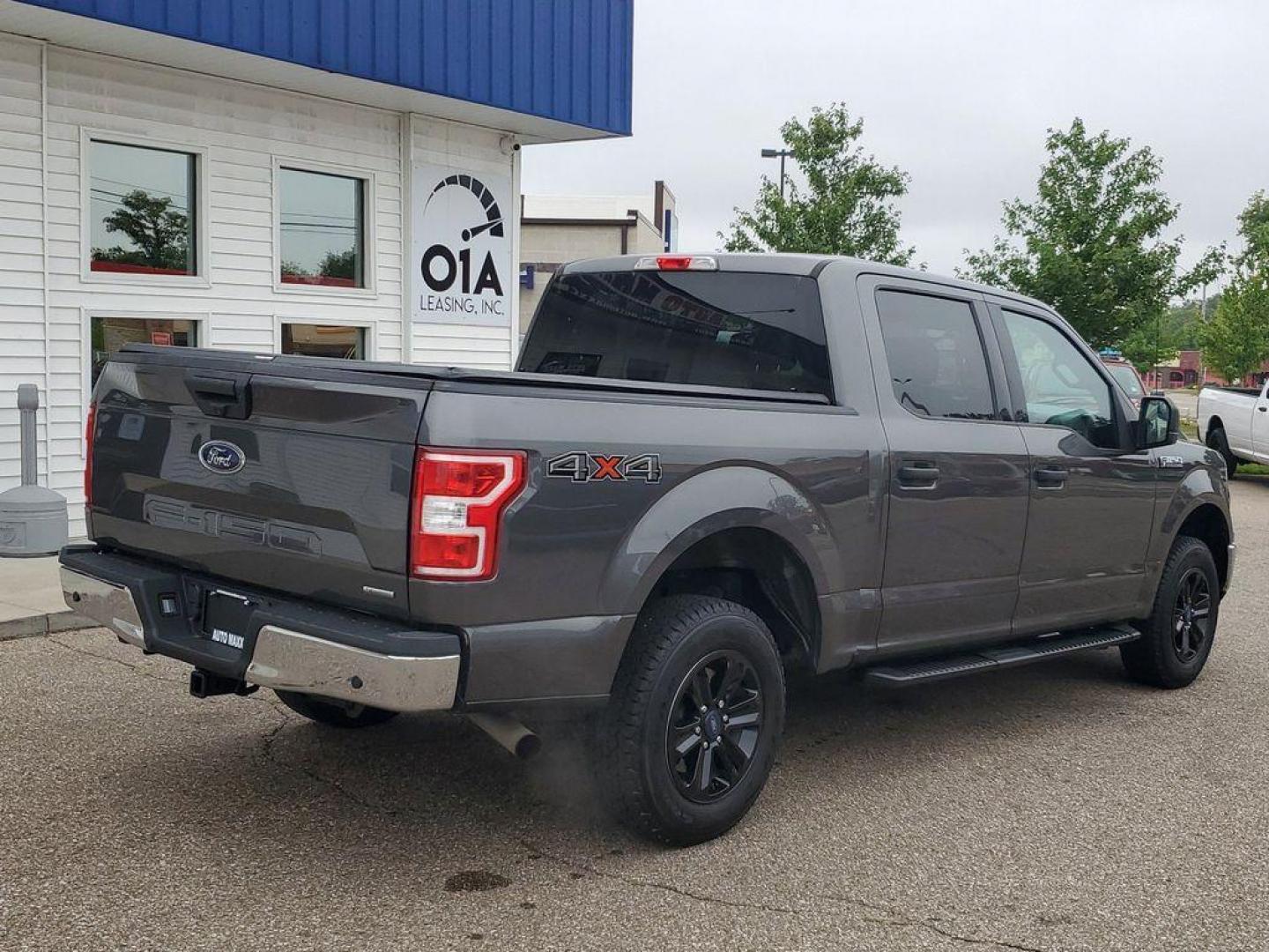 2020 Magnetic /Medium Earth Grey Ford F-150 XLT SuperCrew 6.5-ft. Bed 4WD (1FTEW1E43LF) with an 3.5L V6 TURBO engine, 6A transmission, located at 234 Columbia Ave, Battle Creek, MI, 49015, (269) 222-0088, 42.298264, -85.192543 - <b>Vehicle Details</b><br>Introducing the exceptional 2020 Ford F-150 XLT, now available at our esteemed dealership. This impressive used pickup truck combines raw power with advanced features, making it the perfect choice for both work and leisure. With a remarkable 119,811 miles on the odometer, t - Photo#1