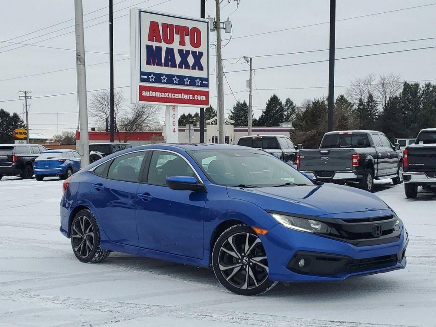 2020 Aegean Blue Metallic /Black Honda Civic EX Honda Sensing Sedan CVT (2HGFC2F82LH) with an 2.0L L4 DOHC 16V engine, CVT transmission, located at 6064 Gull Rd, Kalamazoo, MI, 49048, (269) 222-0088, 42.328388, -85.512924 - <b>Vehicle Details</b><br>Get ready to elevate your driving experience with this outstanding 2020 Honda Civic Sport! Designed for those who crave a balance of performance, style, and technology, this dynamic vehicle is ready to impress. Under the hood, you'll find a robust 4-cylinder, 2.0L engine t - Photo#0