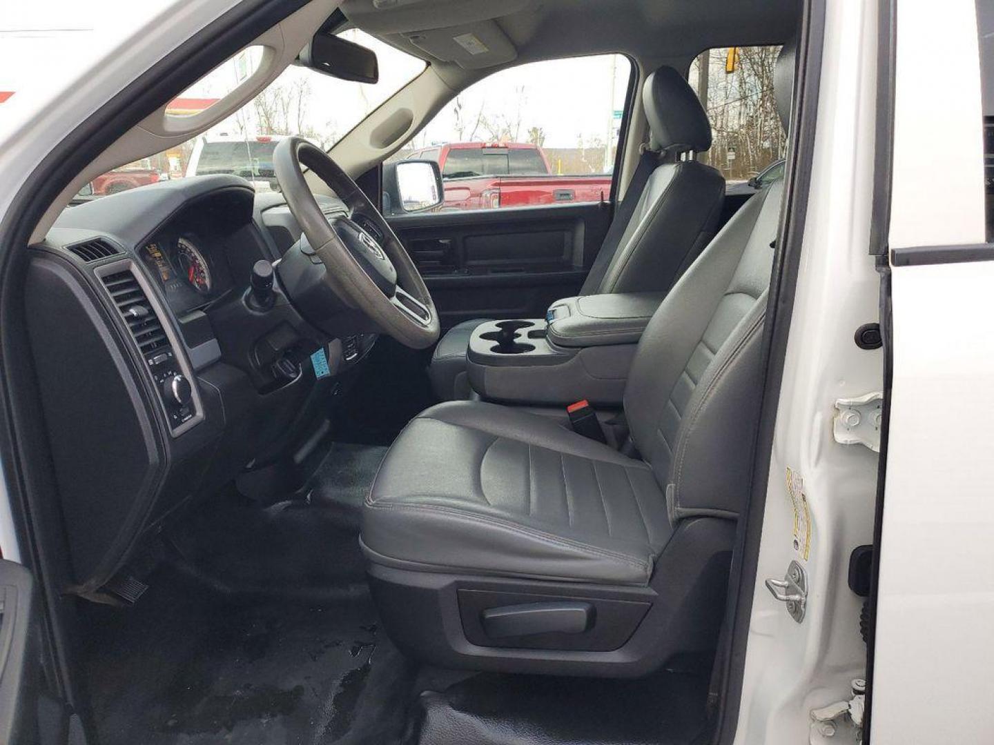 2020 Bright White Clearcoat /Diesel Gray/Black RAM 1500 Classic Tradesman Quad Cab 4WD (1C6RR7FT0LS) with an 5.7L V8 OHV 16V engine, 8A transmission, located at 234 Columbia Ave, Battle Creek, MI, 49015, (269) 222-0088, 42.298264, -85.192543 - Introducing the 2020 Ram 1500 Classic, a robust and versatile pickup that combines power and practicality for any task you throw its way. This model is equipped with a formidable V8, 5.7L engine, ensuring impressive towing capabilities and a smooth driving experience whether on or off the road. The - Photo#8