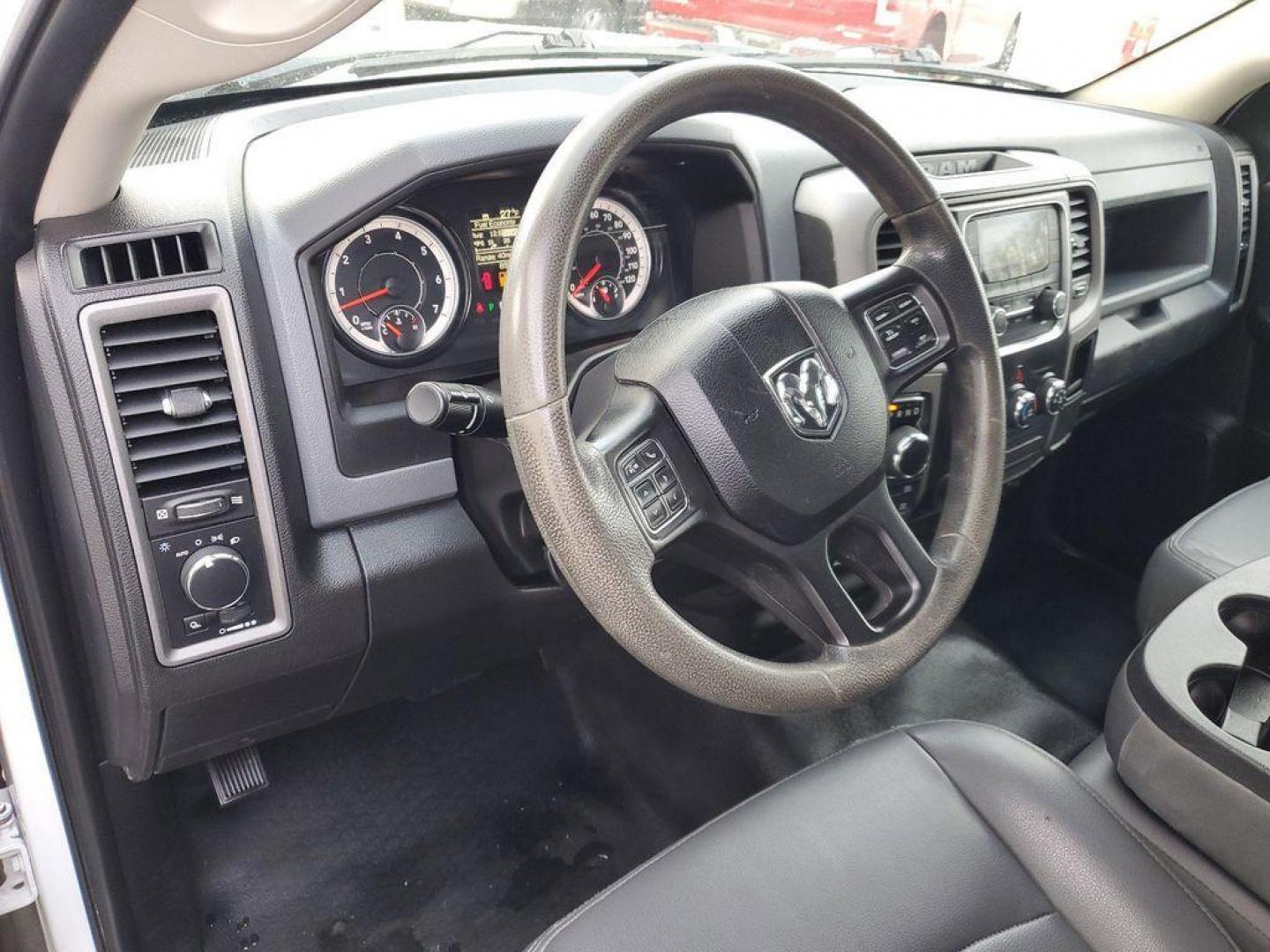 2020 Bright White Clearcoat /Diesel Gray/Black RAM 1500 Classic Tradesman Quad Cab 4WD (1C6RR7FT0LS) with an 5.7L V8 OHV 16V engine, 8A transmission, located at 234 Columbia Ave, Battle Creek, MI, 49015, (269) 222-0088, 42.298264, -85.192543 - Introducing the 2020 Ram 1500 Classic, a robust and versatile pickup that combines power and practicality for any task you throw its way. This model is equipped with a formidable V8, 5.7L engine, ensuring impressive towing capabilities and a smooth driving experience whether on or off the road. The - Photo#11