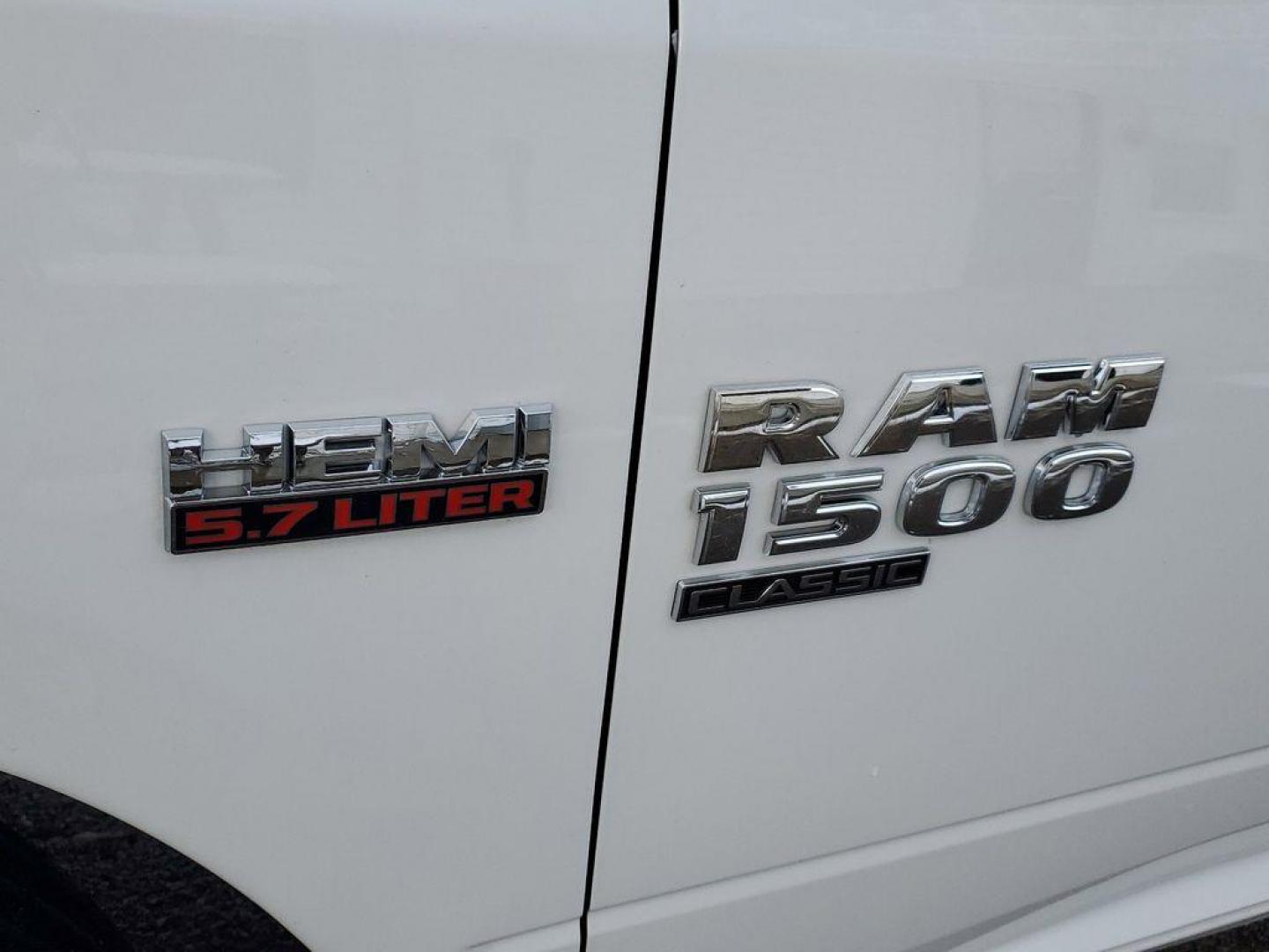 2020 Bright White Clearcoat /Diesel Gray/Black RAM 1500 Classic Tradesman Quad Cab 4WD (1C6RR7FT0LS) with an 5.7L V8 OHV 16V engine, 8A transmission, located at 234 Columbia Ave, Battle Creek, MI, 49015, (269) 222-0088, 42.298264, -85.192543 - Introducing the 2020 Ram 1500 Classic, a robust and versatile pickup that combines power and practicality for any task you throw its way. This model is equipped with a formidable V8, 5.7L engine, ensuring impressive towing capabilities and a smooth driving experience whether on or off the road. The - Photo#5