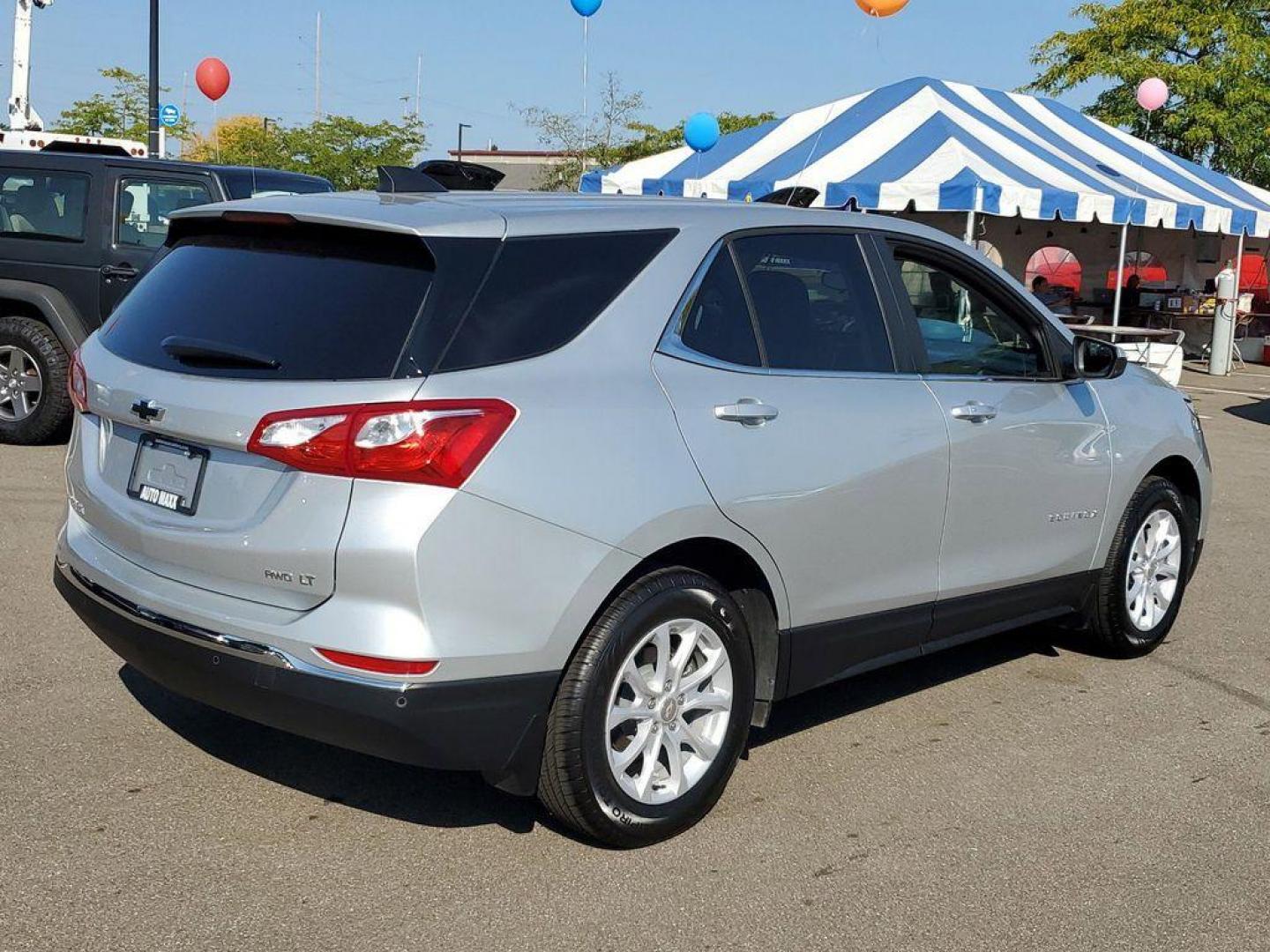 2021 Silver Ice Metallic /Jet Black Chevrolet Equinox LT AWD (3GNAXUEV8MS) with an 1.5L L4 DOHC 16V TURBO engine, 6A transmission, located at 234 Columbia Ave, Battle Creek, MI, 49015, (269) 222-0088, 42.298264, -85.192543 - <b>Vehicle Details</b><br>Introducing the 2021 Chevrolet Equinox LT, a well-maintained, pre-owned vehicle with 40,718 miles on the odometer. This compact SUV is equipped with a reliable 4-cylinder, 1.5L engine, delivering a balanced combination of power and efficiency, perfect for both city commutes - Photo#1