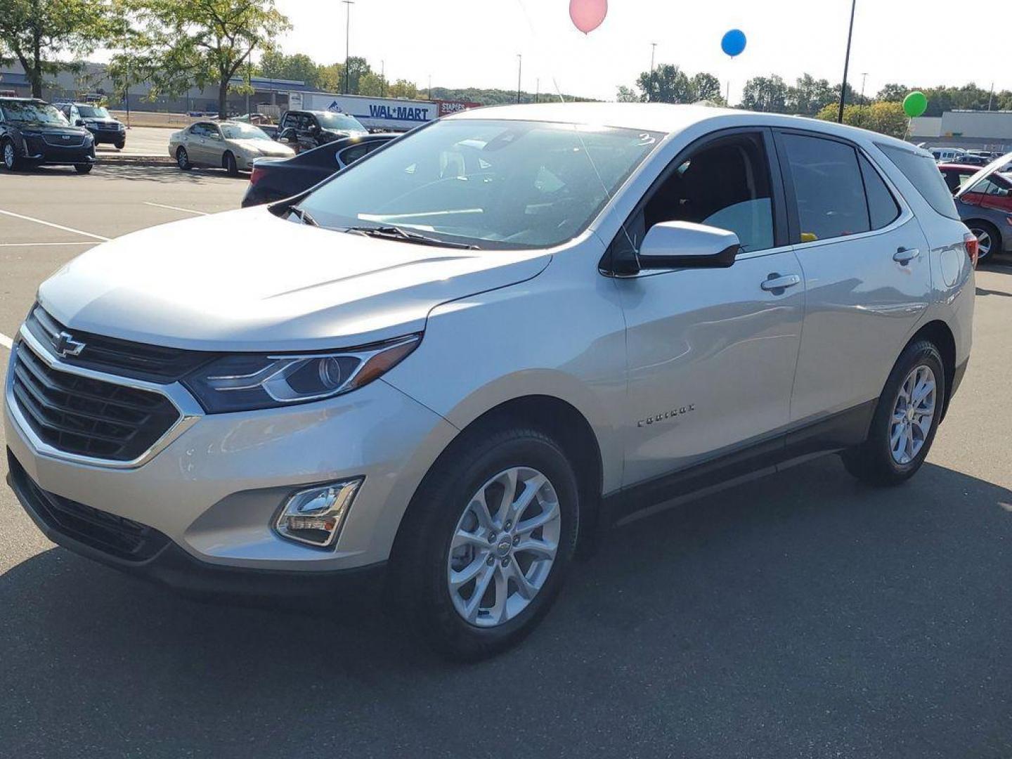 2021 Silver Ice Metallic /Jet Black Chevrolet Equinox LT AWD (3GNAXUEV8MS) with an 1.5L L4 DOHC 16V TURBO engine, 6A transmission, located at 234 Columbia Ave, Battle Creek, MI, 49015, (269) 222-0088, 42.298264, -85.192543 - <b>Vehicle Details</b><br>Introducing the 2021 Chevrolet Equinox LT, a well-maintained, pre-owned vehicle with 40,718 miles on the odometer. This compact SUV is equipped with a reliable 4-cylinder, 1.5L engine, delivering a balanced combination of power and efficiency, perfect for both city commutes - Photo#3