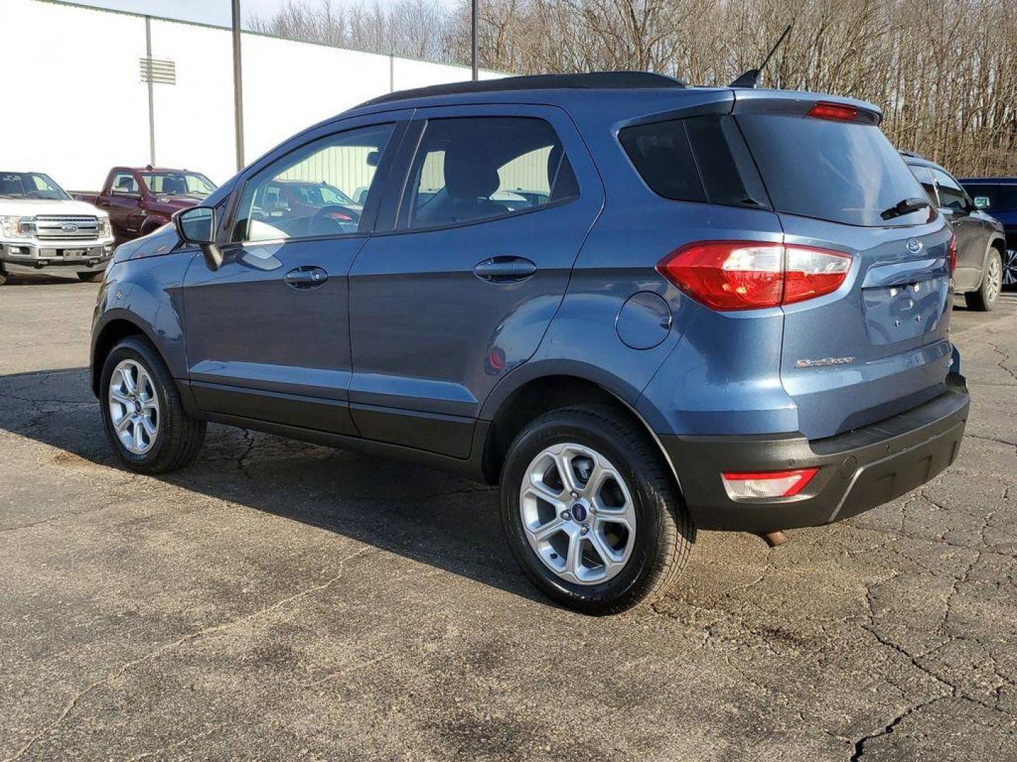 2021 Blue Metallic /Ebony Black Ford EcoSport SE AWD (MAJ6S3GL6MC) with an 2.0L L4 DOHC 16V engine, 6A transmission, located at 234 Columbia Ave, Battle Creek, MI, 49015, (269) 222-0088, 42.298264, -85.192543 - <b>Vehicle Details</b><br>Looking for a reliable and stylish SUV that can handle any terrain? Look no further than this incredible 2021 Ford Ecosport SE! With only 53576 miles on the odometer, this vehicle is practically brand new and ready to hit the road. Equipped with a powerful L4, 2.0L engine - Photo#3