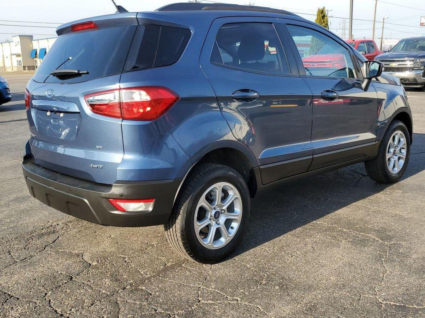 2021 Blue Metallic /Ebony Black Ford EcoSport SE AWD (MAJ6S3GL6MC) with an 2.0L L4 DOHC 16V engine, 6A transmission, located at 234 Columbia Ave, Battle Creek, MI, 49015, (269) 222-0088, 42.298264, -85.192543 - <b>Vehicle Details</b><br>Looking for a reliable and stylish SUV that can handle any terrain? Look no further than this incredible 2021 Ford Ecosport SE! With only 53576 miles on the odometer, this vehicle is practically brand new and ready to hit the road. Equipped with a powerful L4, 2.0L engine - Photo#4