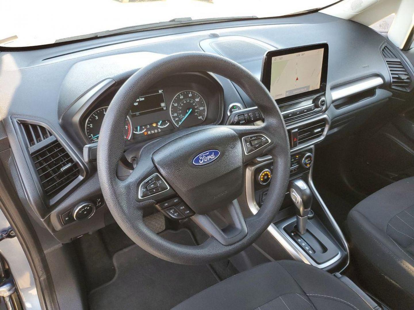 2021 Blue Metallic /Ebony Black Ford EcoSport SE AWD (MAJ6S3GL6MC) with an 2.0L L4 DOHC 16V engine, 6A transmission, located at 234 Columbia Ave, Battle Creek, MI, 49015, (269) 222-0088, 42.298264, -85.192543 - <b>Vehicle Details</b><br>Looking for a reliable and stylish SUV that can handle any terrain? Look no further than this incredible 2021 Ford Ecosport SE! With only 53576 miles on the odometer, this vehicle is practically brand new and ready to hit the road. Equipped with a powerful L4, 2.0L engine - Photo#22