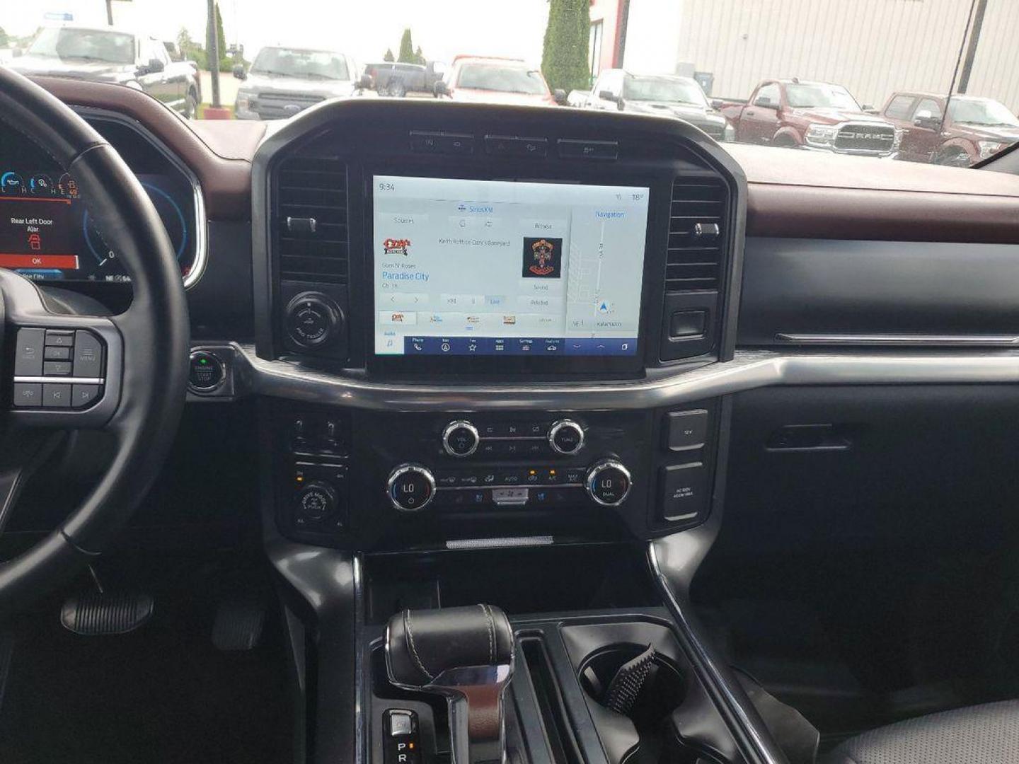 2021 Rapid Red Metallic Tinted Clearcoat /Black Ford F-150 Lariat SuperCrew 5.5-ft. Bed 4WD (1FTFW1E84MK) with an 4.6L V8 SOHC 24V engine, 10-speed automatic transmission, located at 234 Columbia Ave, Battle Creek, MI, 49015, (269) 222-0088, 42.298264, -85.192543 - <b>Vehicle Details</b><br>Experience the perfect blend of power, luxury, and technology with this stunning pre-owned 2021 Ford F-150 LARIAT! This truck is built to impress, featuring a mighty V6, 3.5L engine that delivers robust performance whether you're on the highway or tackling rugged terrain. T - Photo#13