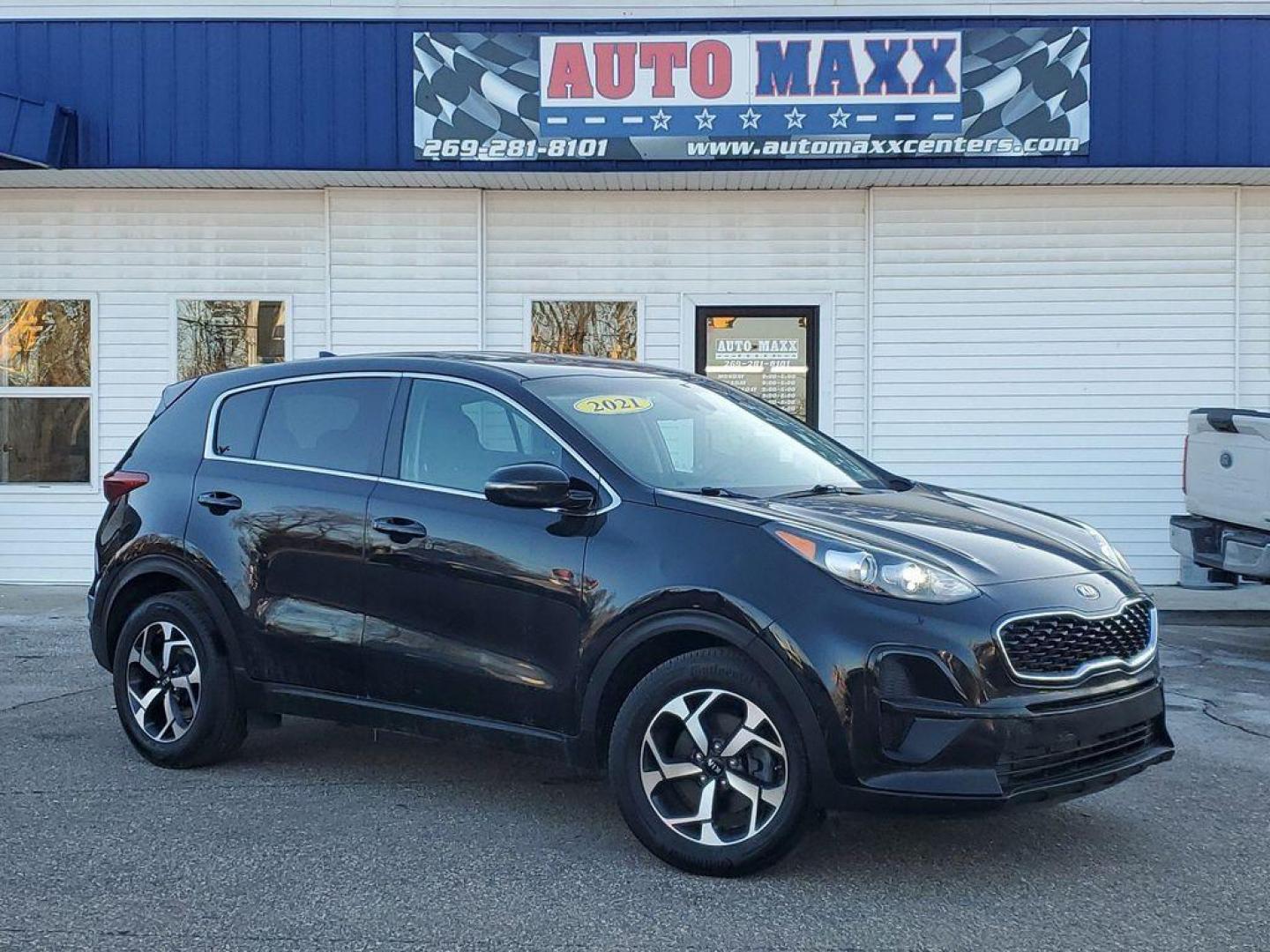 2021 Black Cherry /Black Kia Sportage LX FWD (KNDPM3AC4M7) with an 2.4L V6 DOHC 24V engine, 6A transmission, located at 234 Columbia Ave, Battle Creek, MI, 49015, (269) 222-0088, 42.298264, -85.192543 - <b>Vehicle Details</b><br>For sale: a stylish and reliable 2021 Kia Sportage LX, perfect for those seeking comfort and practicality in their drive. This well-maintained SUV, featuring a Front-Wheel Drive (FWD) configuration, is powered by an efficient 4-cylinder, 2.4L engine, offering a smooth and r - Photo#0