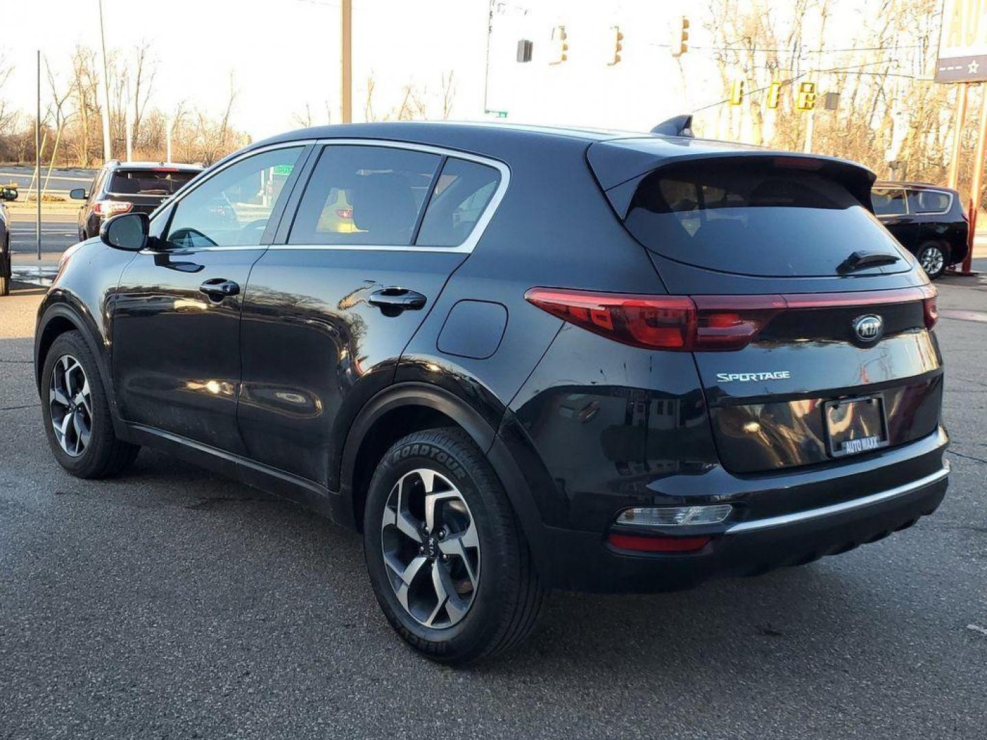 2021 Black Cherry /Black Kia Sportage LX FWD (KNDPM3AC4M7) with an 2.4L V6 DOHC 24V engine, 6A transmission, located at 234 Columbia Ave, Battle Creek, MI, 49015, (269) 222-0088, 42.298264, -85.192543 - <b>Vehicle Details</b><br>For sale: a stylish and reliable 2021 Kia Sportage LX, perfect for those seeking comfort and practicality in their drive. This well-maintained SUV, featuring a Front-Wheel Drive (FWD) configuration, is powered by an efficient 4-cylinder, 2.4L engine, offering a smooth and r - Photo#2