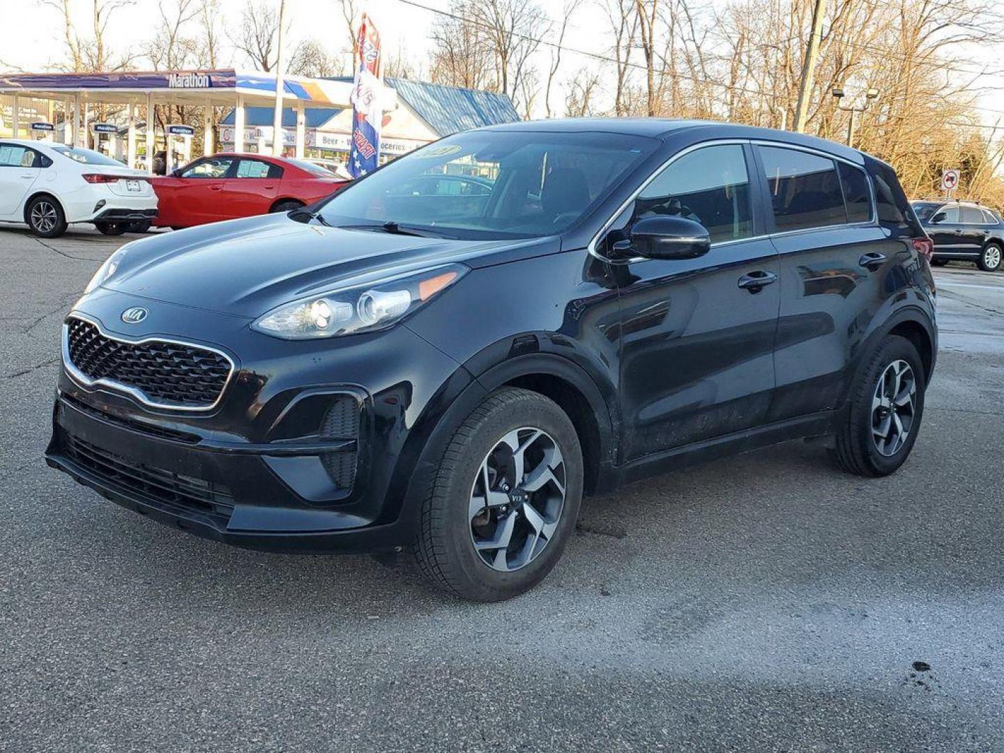 2021 Black Cherry /Black Kia Sportage LX FWD (KNDPM3AC4M7) with an 2.4L V6 DOHC 24V engine, 6A transmission, located at 234 Columbia Ave, Battle Creek, MI, 49015, (269) 222-0088, 42.298264, -85.192543 - <b>Vehicle Details</b><br>For sale: a stylish and reliable 2021 Kia Sportage LX, perfect for those seeking comfort and practicality in their drive. This well-maintained SUV, featuring a Front-Wheel Drive (FWD) configuration, is powered by an efficient 4-cylinder, 2.4L engine, offering a smooth and r - Photo#3