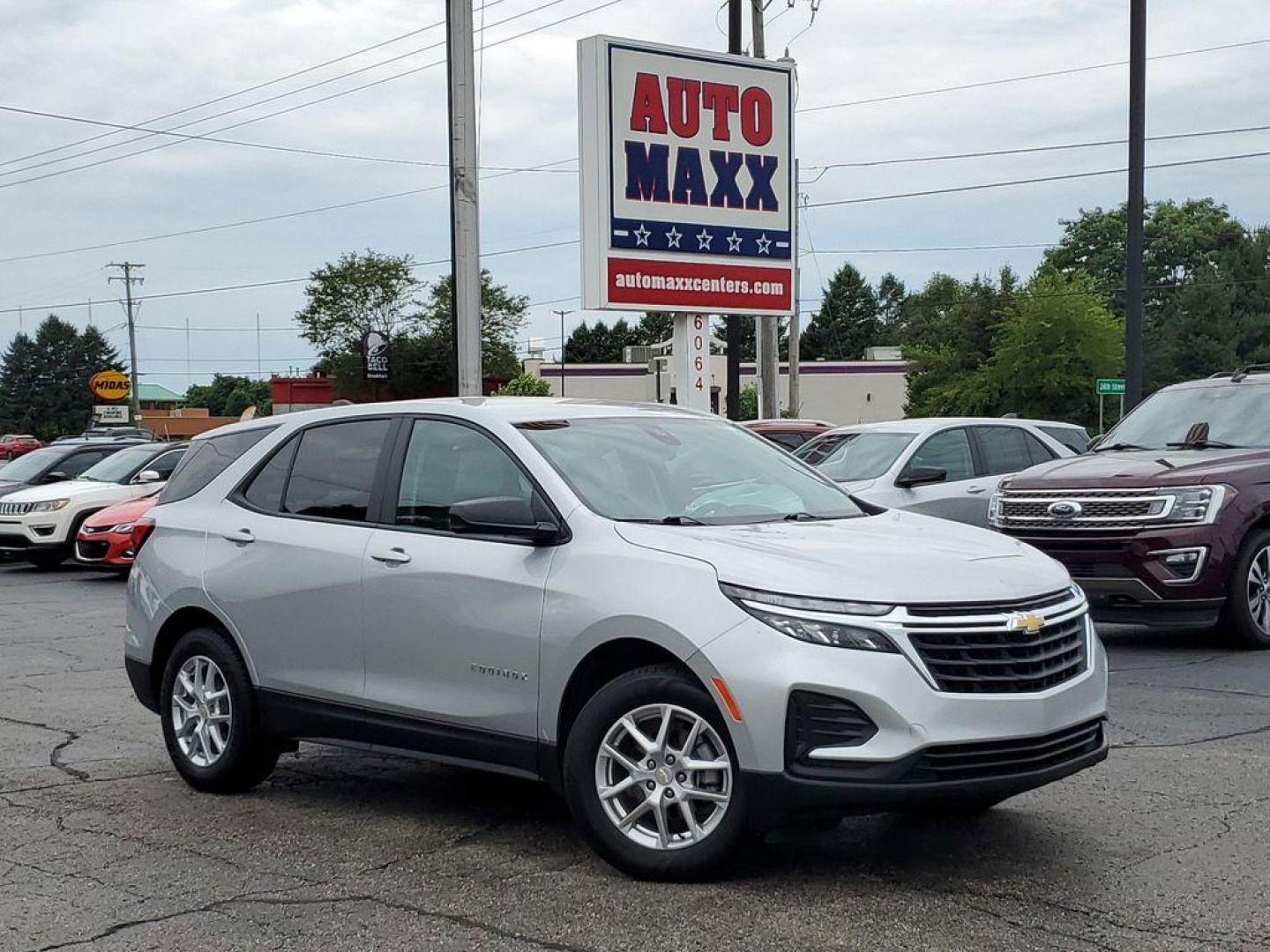 2022 Silver Ice Metallic /Medium Ash Gray Chevrolet Equinox LS 1.5 AWD (3GNAXSEV4NS) with an 1.5L L4 DOHC 16V TURBO engine, 6A transmission, located at 6064 Gull Rd, Kalamazoo, MI, 49048, (269) 222-0088, 42.328388, -85.512924 - <b>Vehicle Details</b><br>For sale at our dealership: a well-maintained 2022 Chevrolet Equinox LS with AWD, equipped with a robust L4, 1.5L engine. This versatile SUV is perfect for those seeking reliability and modern features in a pre-owned vehicle. It comes certified as a CARFAX 1-Owner, ensuring - Photo#0