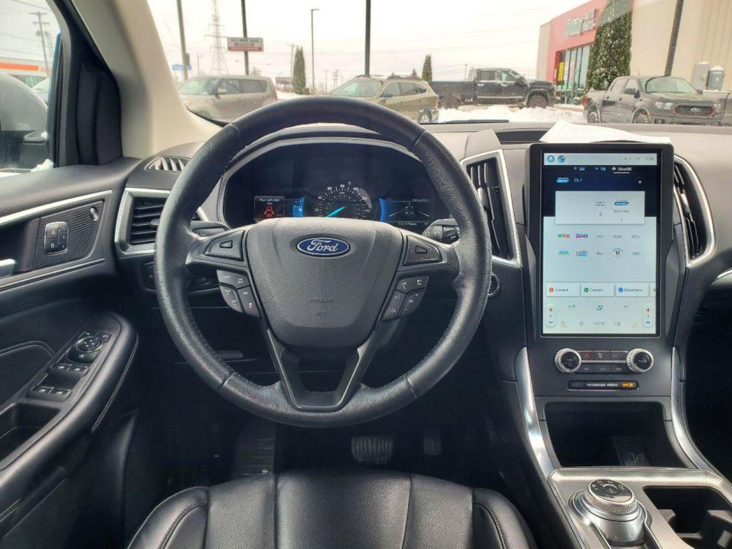 2022 Iconic Silver Metallic /Ebony Ford Edge Titanium AWD (2FMPK4K97NB) with an 2.0L L4 DOHC 16V engine, 6A transmission, located at 6064 Gull Rd, Kalamazoo, MI, 49048, (269) 222-0088, 42.328388, -85.512924 - <b>Vehicle Details</b><br>Discover the perfect blend of sophistication, power, and advanced technology with this stunning 2022 Ford Edge Titanium AWD. This remarkable SUV is designed to elevate every drive with its sleek exterior and luxurious interior, offering a harmonious balance of style and fun - Photo#13