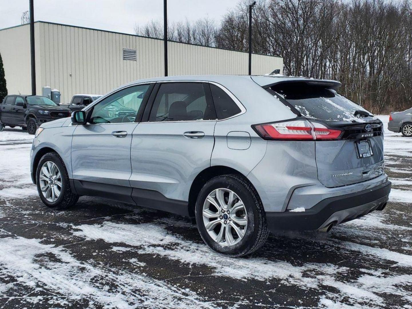 2022 Iconic Silver Metallic /Ebony Ford Edge Titanium AWD (2FMPK4K97NB) with an 2.0L L4 DOHC 16V engine, 6A transmission, located at 6064 Gull Rd, Kalamazoo, MI, 49048, (269) 222-0088, 42.328388, -85.512924 - <b>Vehicle Details</b><br>Discover the perfect blend of sophistication, power, and advanced technology with this stunning 2022 Ford Edge Titanium AWD. This remarkable SUV is designed to elevate every drive with its sleek exterior and luxurious interior, offering a harmonious balance of style and fun - Photo#2