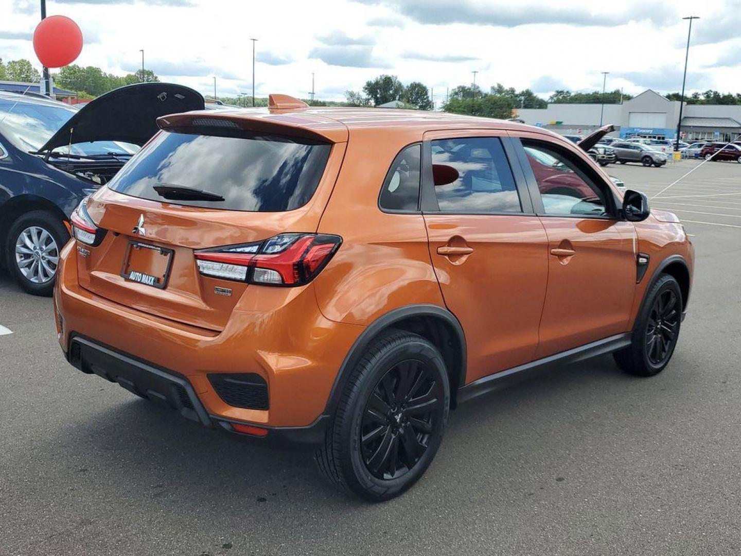 2022 Orange Sunrise Metallic /Black Mitsubishi Outlander Sport 2.0 ES CVT (JA4APUAU3NU) with an 2.0L L4 DOHC 16V engine, CVT transmission, located at 234 Columbia Ave, Battle Creek, MI, 49015, (269) 222-0088, 42.298264, -85.192543 - Discover the impressive 2022 Mitsubishi Outlander Sport LE, a versatile and stylish compact SUV that combines performance with modern conveniences. This well-maintained vehicle boasts 31,233 miles and features a robust L4, 2.0L engine paired with Front-Wheel Drive (FWD), ensuring a smooth and respon - Photo#1